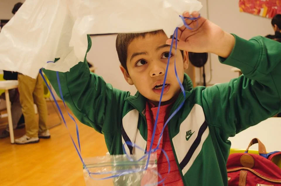 They did an experiment in which they created parachutes and tested to see if they could withstand an egg drop test.