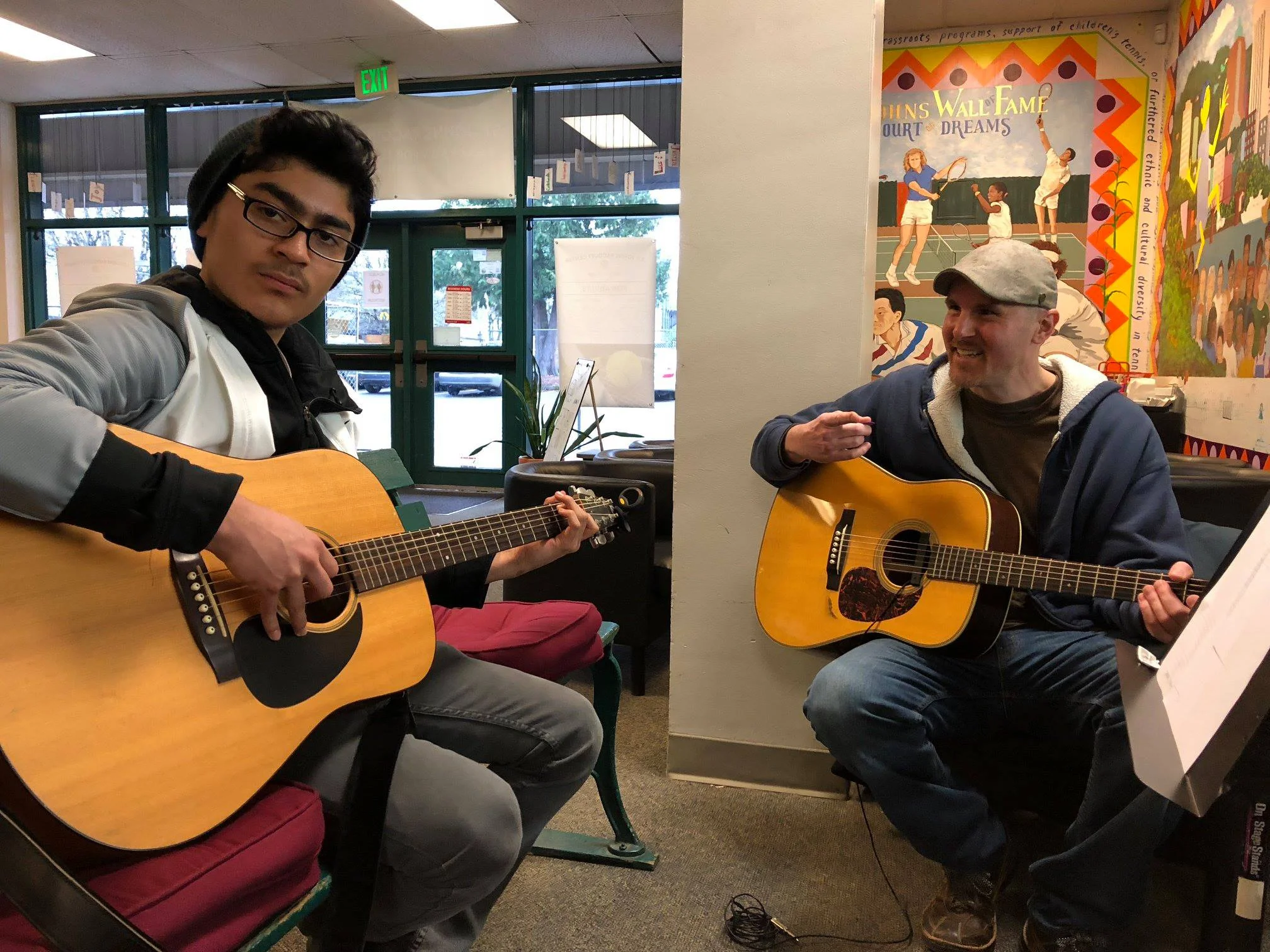 Coach Jason working with Oscar one of the stars of our PT&E Music Program