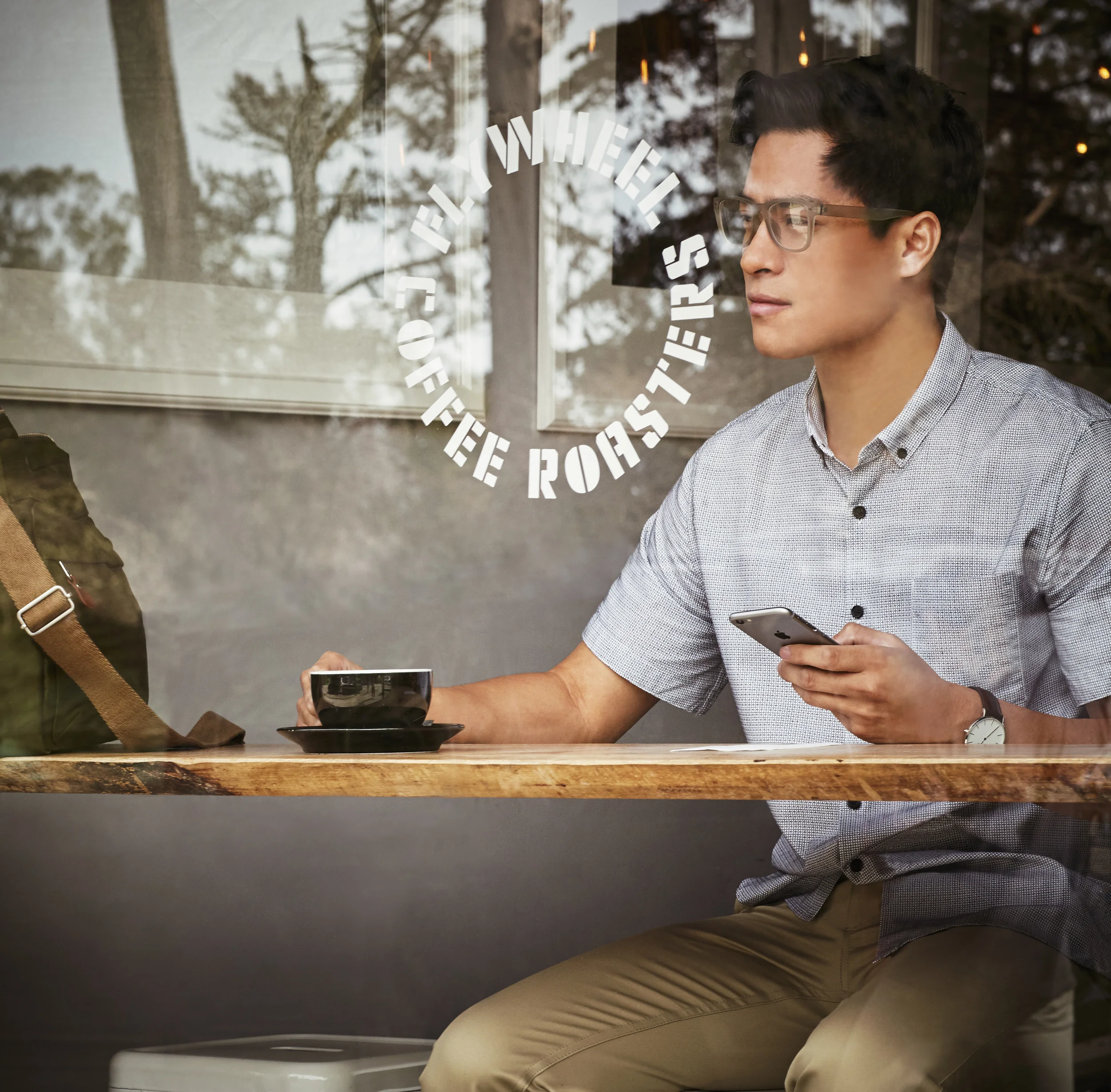 James with device from outside cafe 4478.jpg