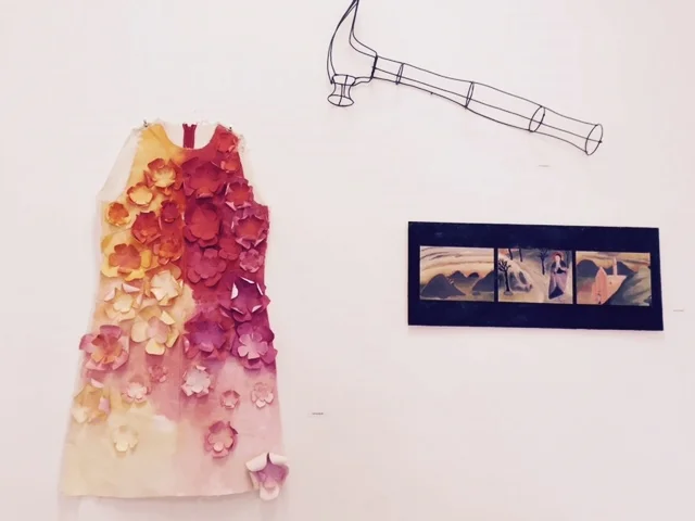Works by Joanna Booth (dress), Anna Maguire (wire sculpture) and Alison Biester.