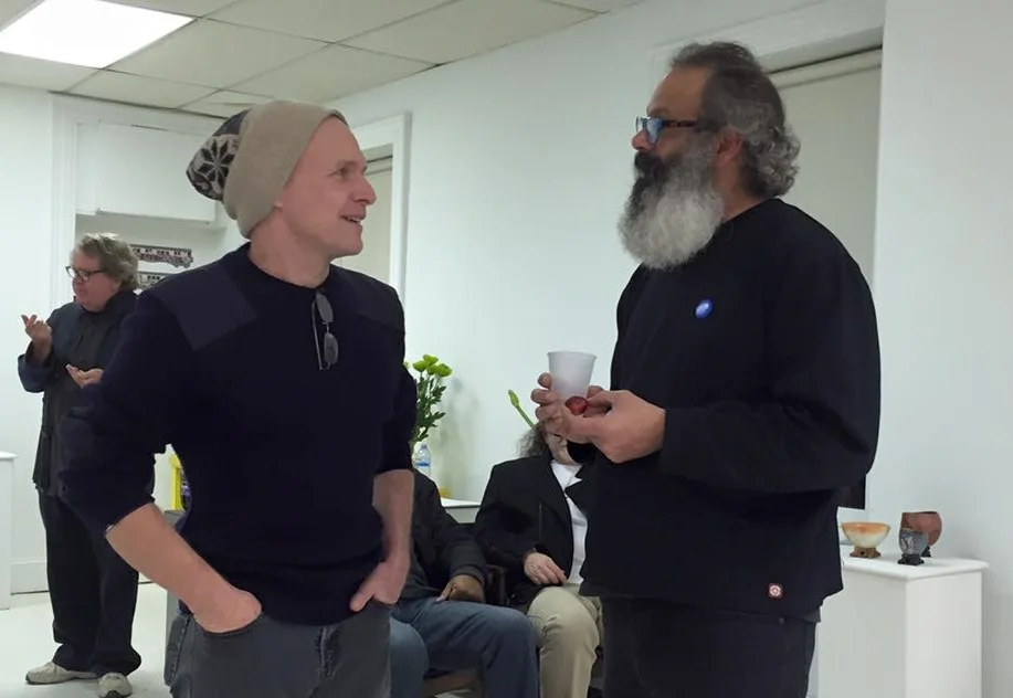 ReDRooM artist Bill Buckley talks with gallery Director Renny Molenaar during the reception.