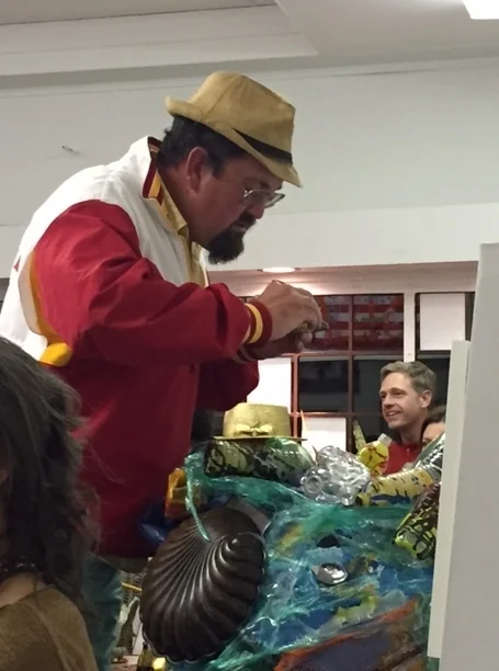 Guest peeking into Simone Spicer's kaleidoscope "Evolution"