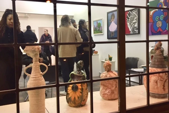 Opening night, ceramic pieces by the window by Meri Adelman