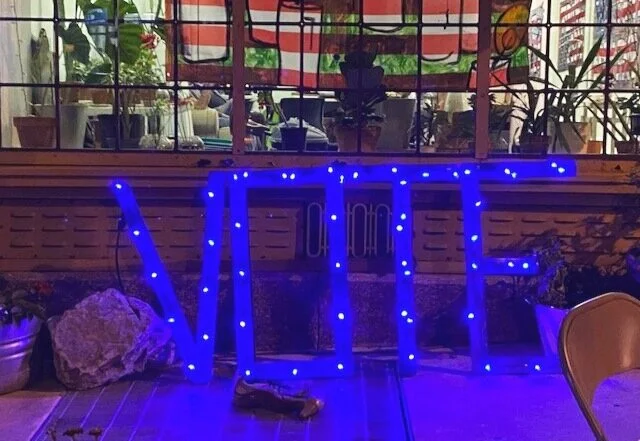 “VOTE” light up sign by sculptor Paige Miller, a tribute to Randy Dalton. Photo by Rocio Cabello