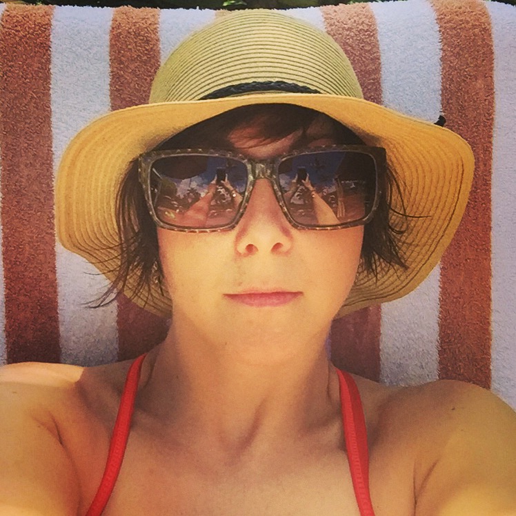 Me, poolside and pre-burned.
