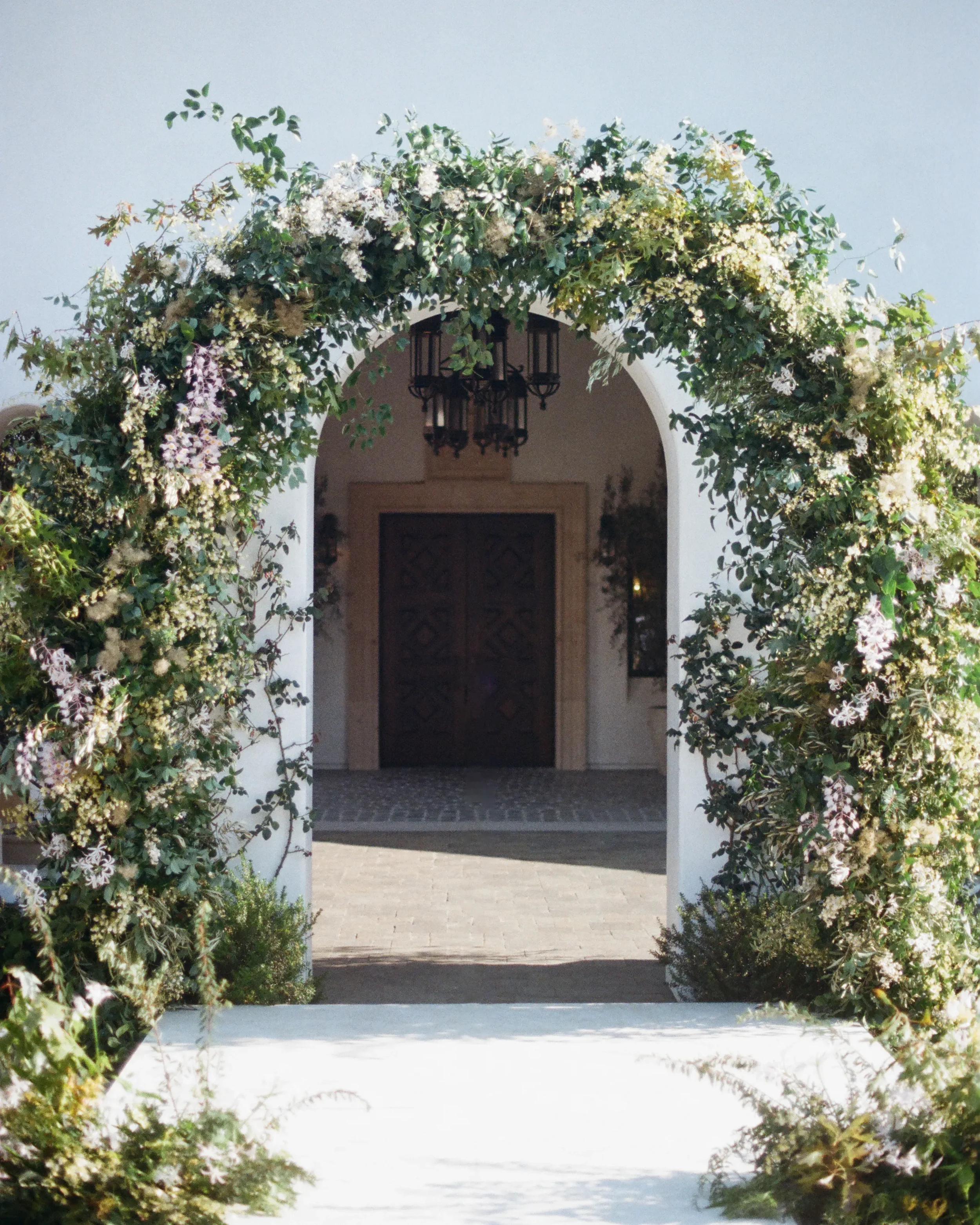 madeline and christopher stef cove wedding arch.webp