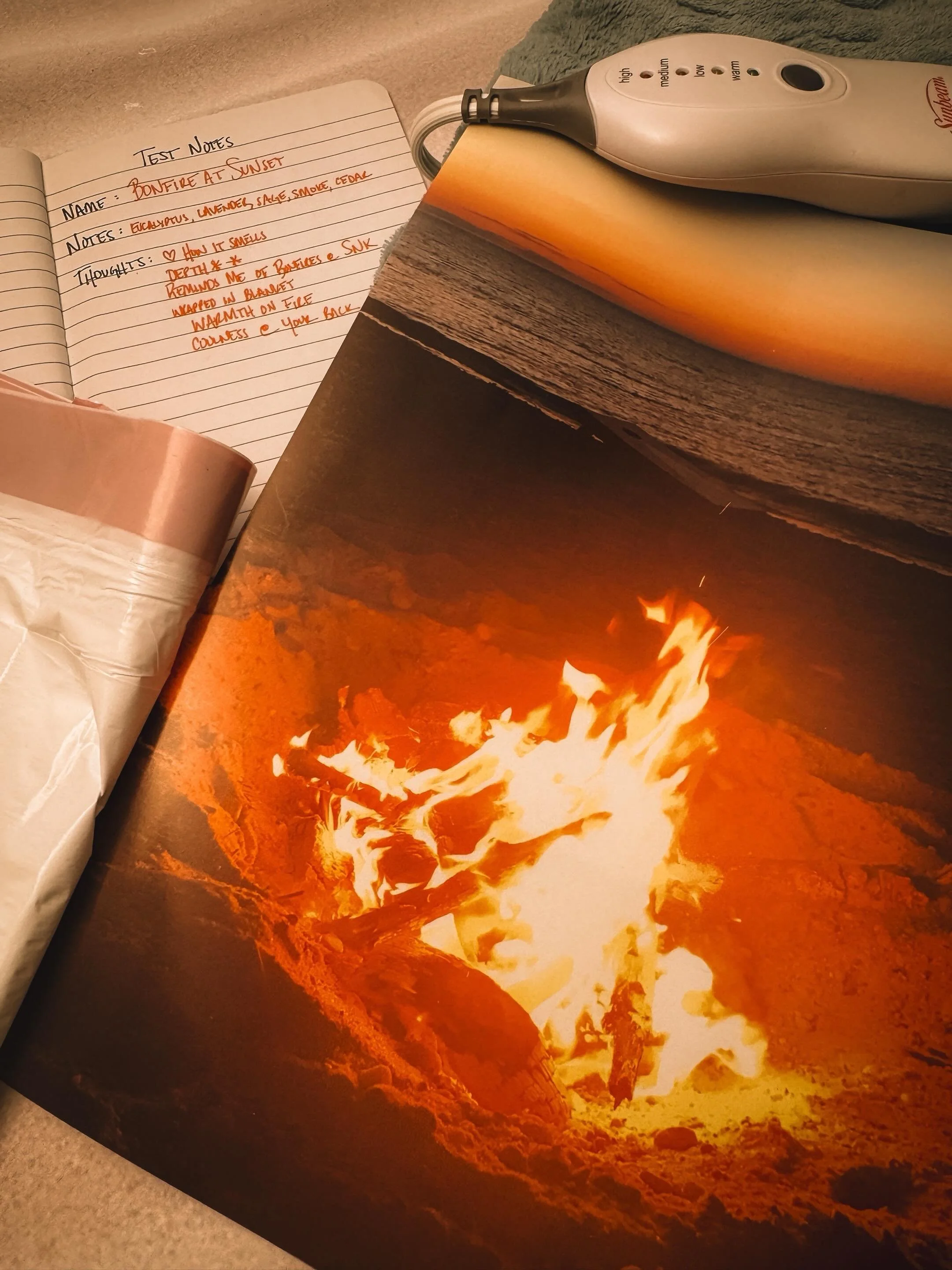 🔥 𝗕𝗼𝗻𝗳𝗶𝗿𝗲 𝗮𝘁 𝗦𝘂𝗻𝘀𝗲𝘁 🔥 is the scent that broke my printer and almost took out my back. ⁣
All because I wanted to use 𝘮𝘺 bonfire photo; the one from a night on the beach that felt warm and golden and perfect. 👌🏽 ⁣
⁣
🖨️ The printer