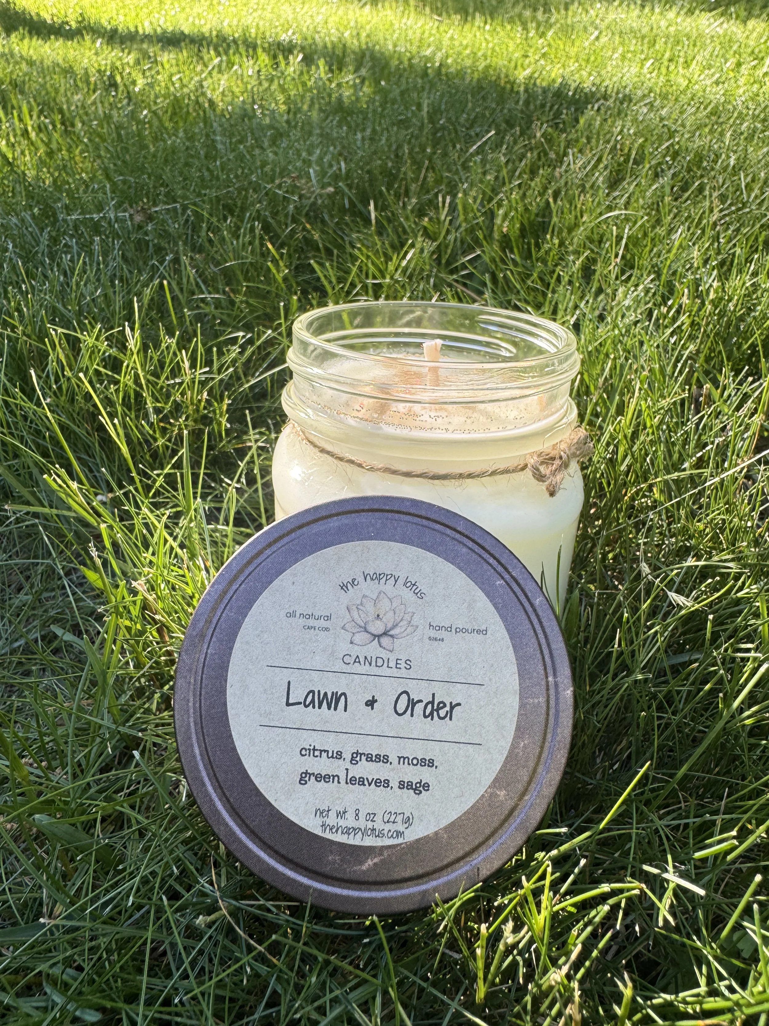 The_Happy_Lotus_Candles_Lawn_and_Order_Scent_6.jpg.JPEG