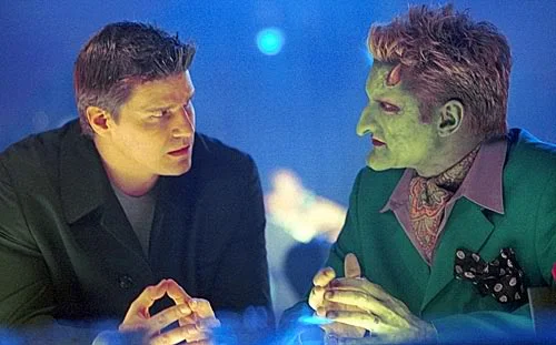 Angel speaks with the demon Lorne.