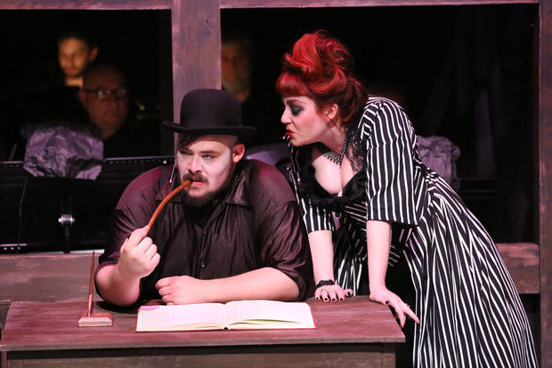 Mr. and Mrs. Peachum (Zachary Allen Farmer and Sarah Porter) in New Line's production