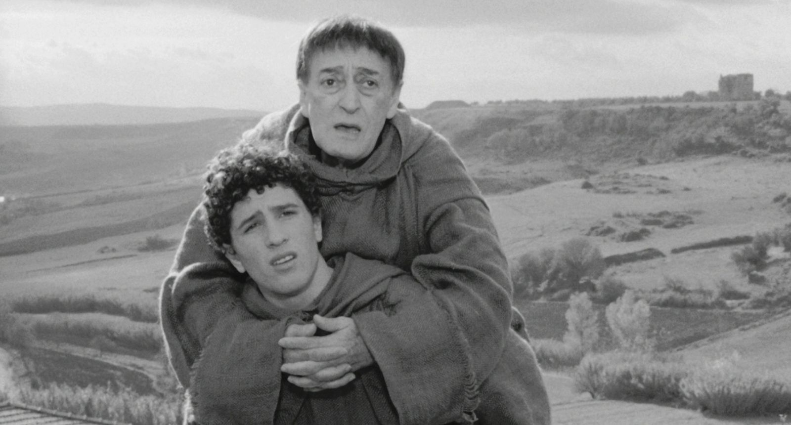 Two monks attempt to instill class consciousness amidst the ruins in Pier Paolo Pasolini's Hawks and Sparrows