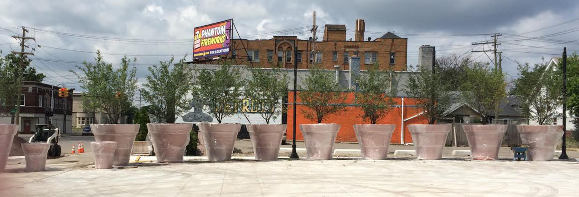 Grosse Pointe's prelude to the fence: blocking Detroit traffic with giant potted plants.