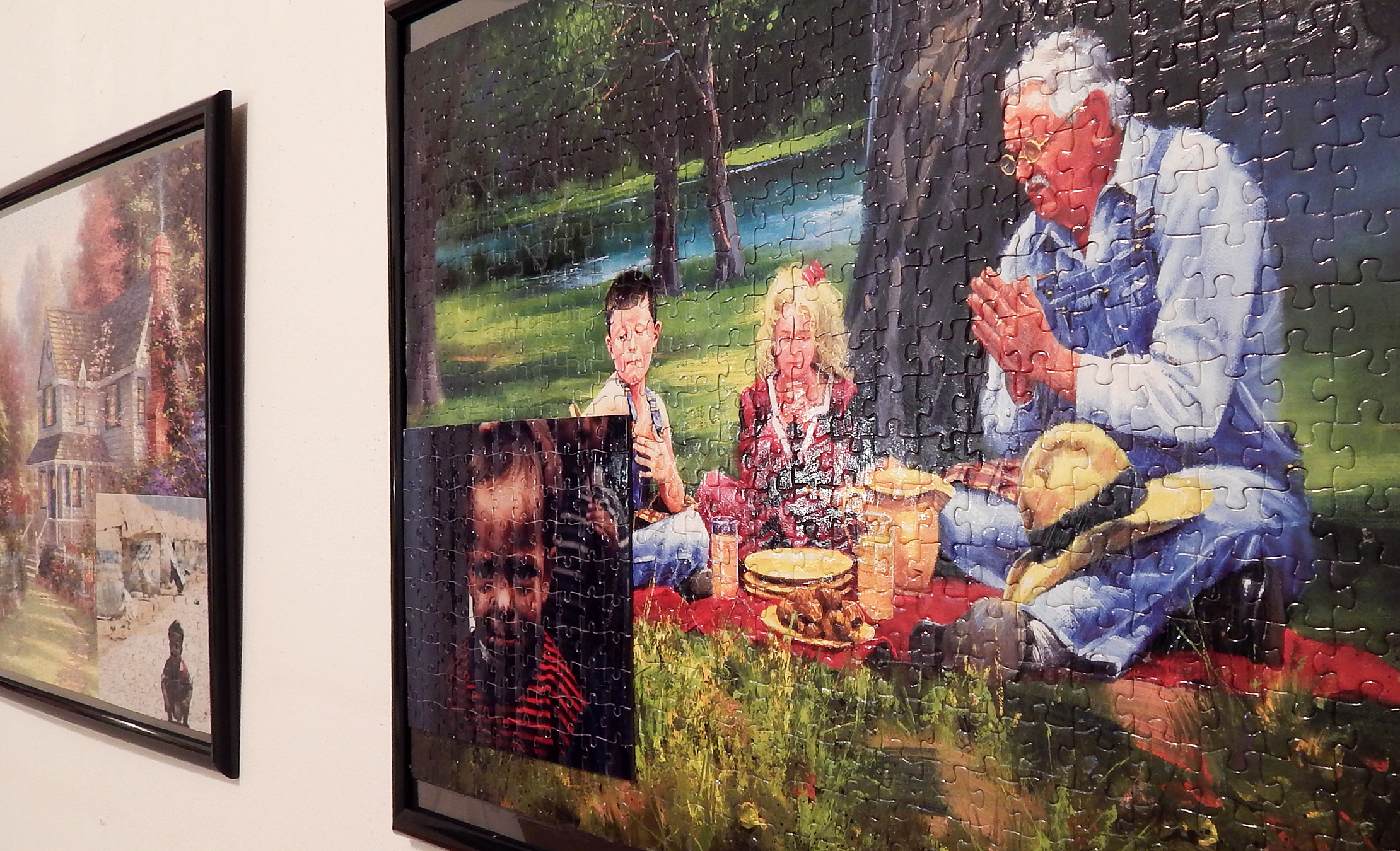 Sharon Rastin's The Blessing (right) and Flying Free (left) during installation at the Dollar Art House.