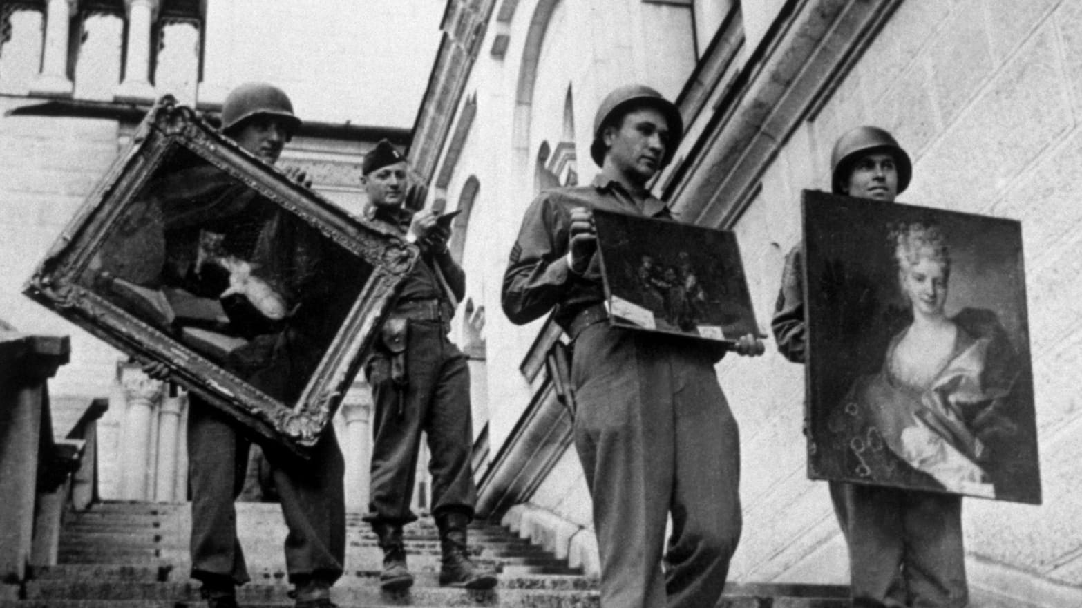 Allied soldiers liberating art stolen by the Nazis at the end of the war.