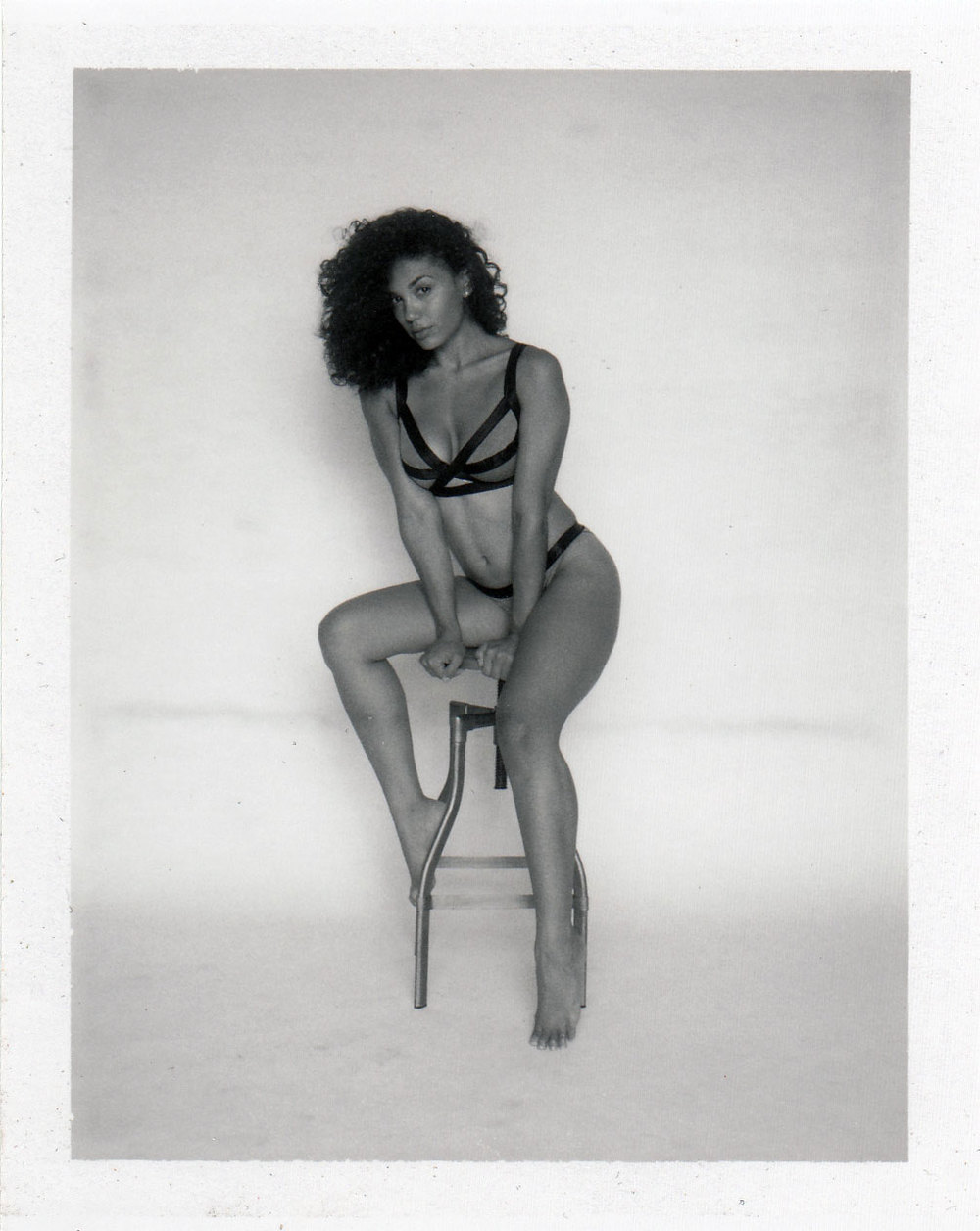 Azure Santos on stool