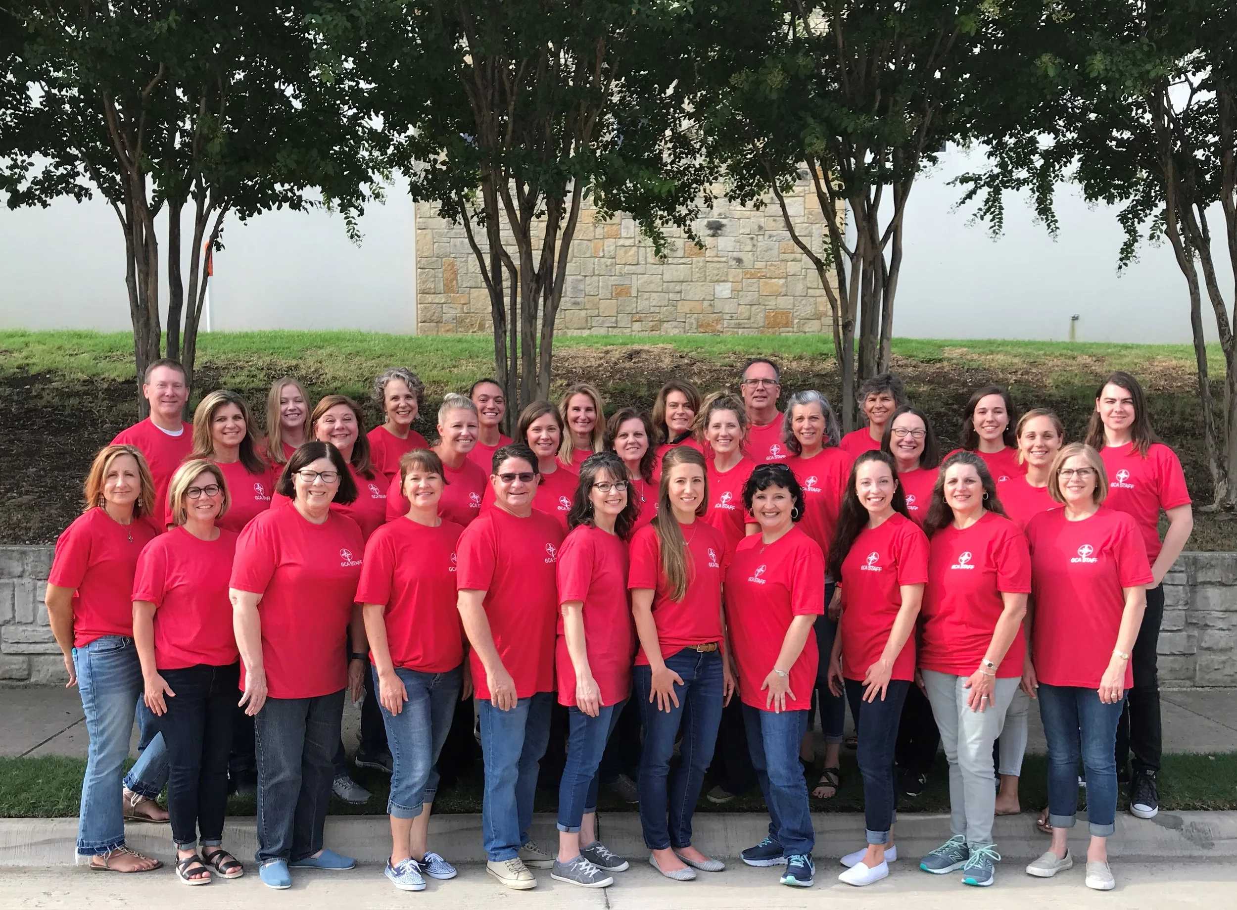 Our 2019-2020 Faculty and Staff: L-R first row: Shannon Rowell, Diane Massey, Sondra Reid, Cari McCorkle, Brad Elledge, Melanie Burchfiel, Ashleigh Gaulke, Julie Rhine, Mary Buri, Kim Slaughter, Amy Smith. 2nd row: Omega Mejia, Shannon Behrman, Angela Grassmuck, Autumn Schafer, Christi Romeo, Julie Saunders, Rae Kramer, Sally Rodgers, Joanna Chipman. 3rd row: Michael McCorkle, Haley Edwards, Kim Martin, Bethany Paul, Julie Buman, Denise Harris, Brian Smith, Elmarie Meintjes, Tiffany Cook, Christian Cook.