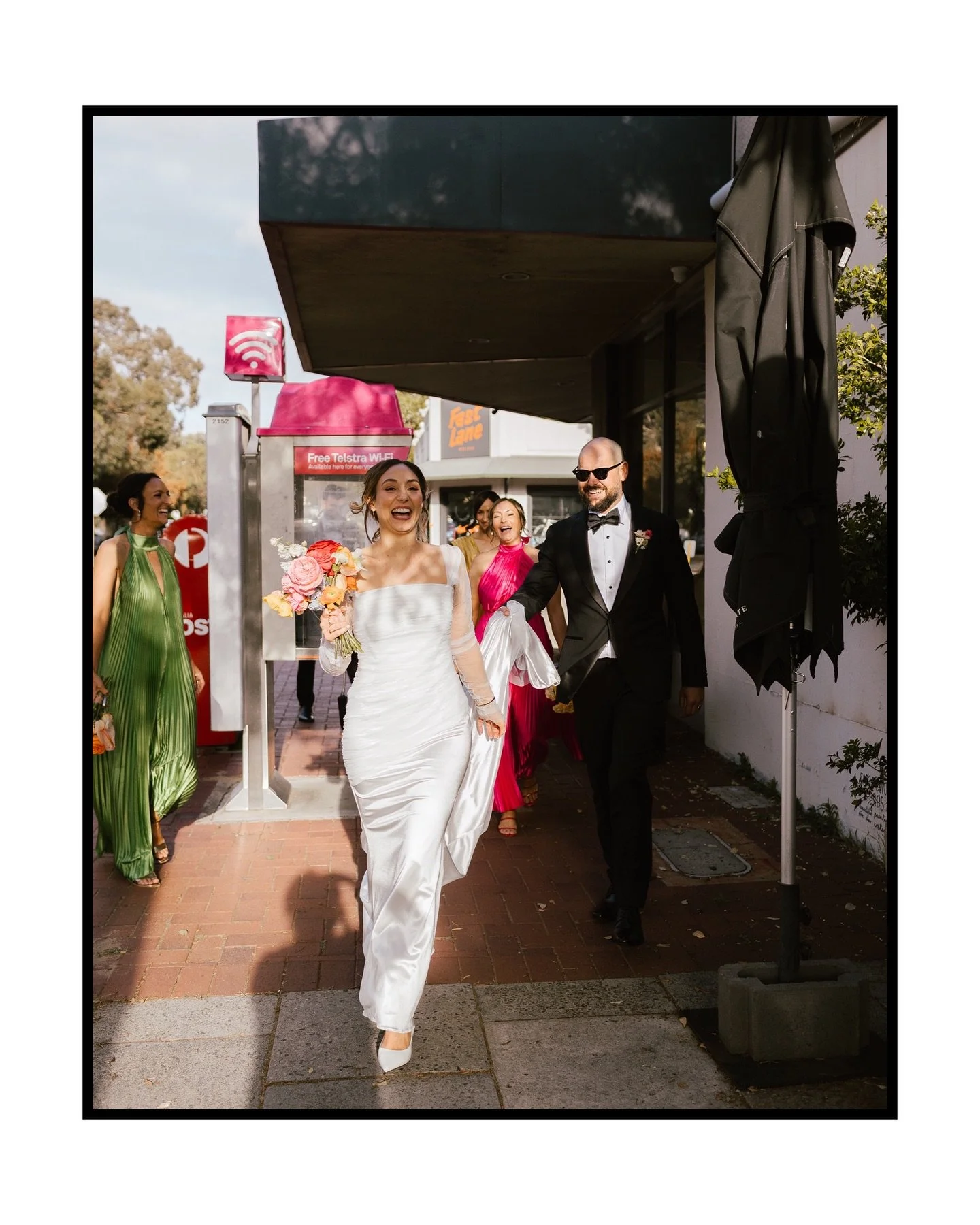 Explosions of colour, explosions of joy &amp; ginormous bubbly happy explosions of love. Two beautiful (rather large) families became one on the day Claire &amp; Russ said I do.