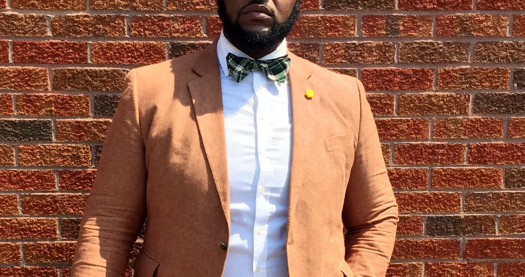 The Look Details: Blazer: by Stafford from here Bow Tie: by Tommy Hillfigure from TJ Maxx similar Pants: by Ralph Lauren from Marshall's similar Shoes: by Stacy Adams here Hat: from Arth Hat Store in Soho, NY similar Watch: from Target here Travel Bag: from Aldo here Lapel Pin: Shop The Big Fashion Guy (link above in shop)