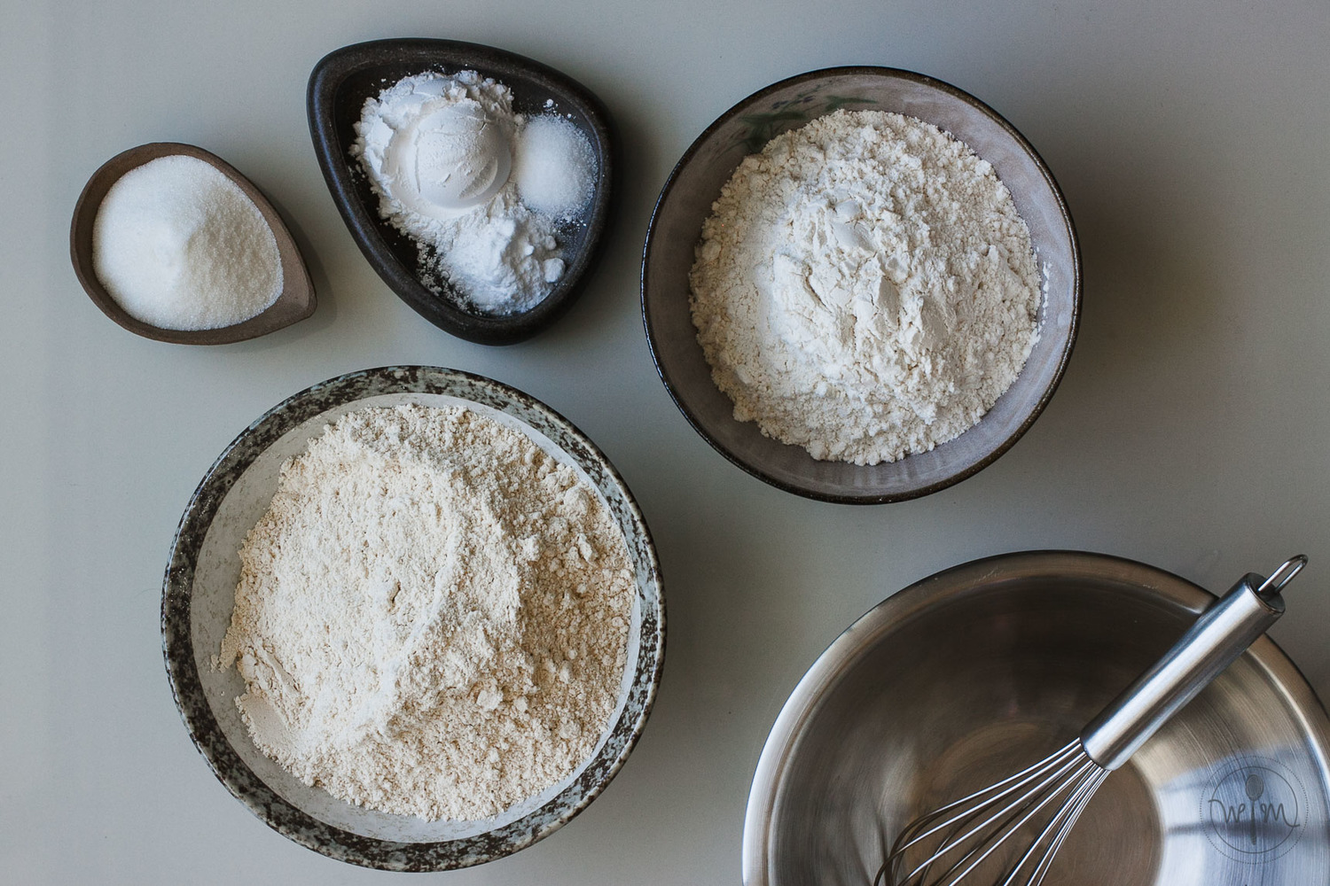 Pancake mix ingredients: (clockwise from right) All-purpose flour, whole wheat flour, caster sugar, baking powder, baking soda, salt - that's really all there is to it, and frankly, that's all there should be!