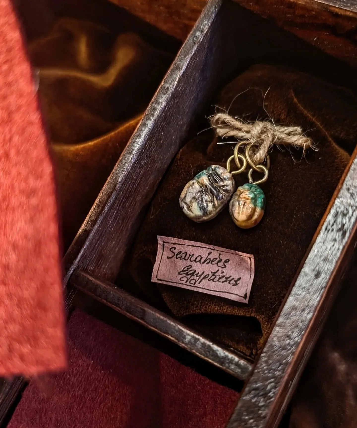 A cabinet of curiosities in the shape of a Wooden Box, created to hold memories and treasures.
This commission was made to cradle at its heart small magical gems of life.

Inside live hand-sculpted Beetle Charms I have made, inspired by true antique 