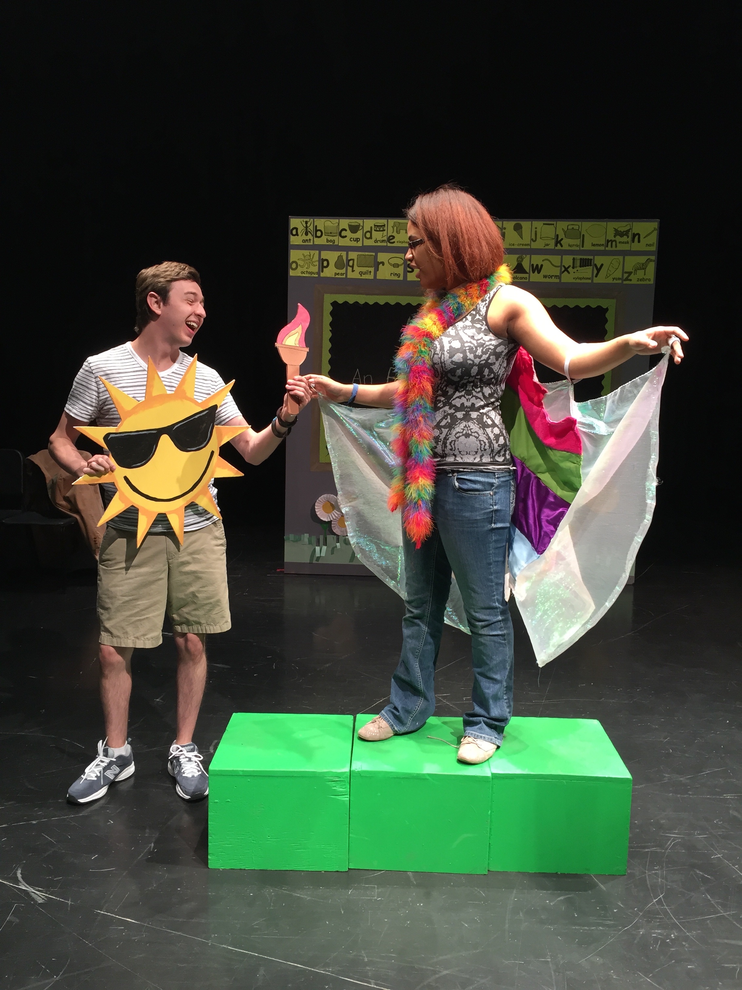 The Sun (Matt Higby), after being instructed by the Creator, hands off fire to Rainbow Crow (BreAwna Harpe), so that she can take it back to the freezing animals. 