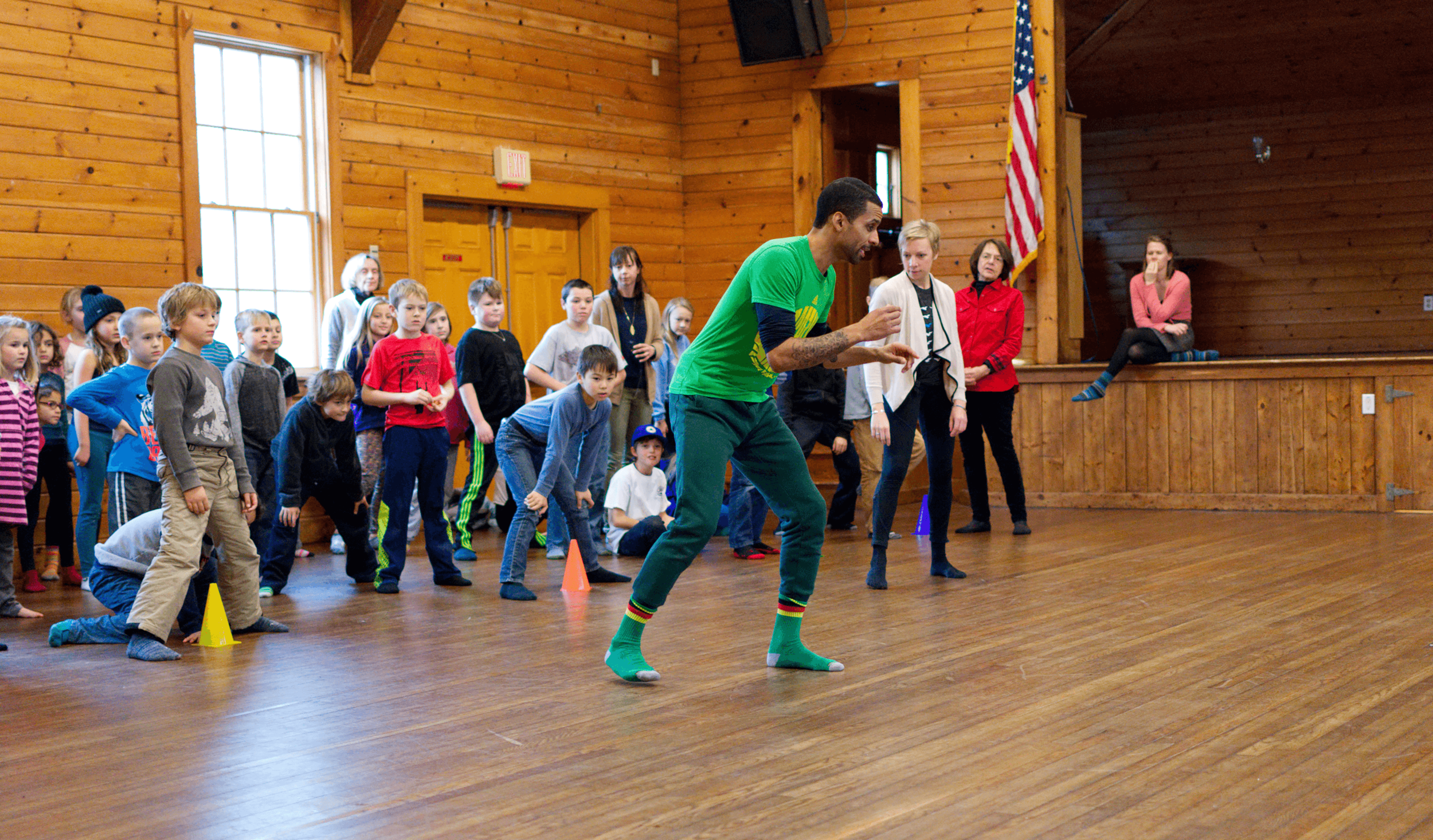 Will Brown leads a brazilian dance workshop with students, photo by brandon ilaw