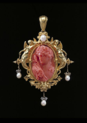 Bacchus by FROMENT-MEURICE & FRANÇOIS-DÉSIRÉ From the collection of The Victoria and Albert Museum ©The Victoria and Albert Museum/ “Coral has been used in jewellery since antiquity. Believed to be an amulet which could protect against the evil eye, it was often worn by children or used in rosaries. In the early 19th century, it began to be exploited in conventional jewellery and became highly fashionable. According to the 19th century French jeweller Henri Vever 'Every day, the coral merchant of H.R.H. Madame, Duchesse d'Angouleme, offers the most elaborate and elegant parures to customers and passers-by: the jewels which are sold there are created with exquisite taste'. Many 19th century designers used historical styles. This one is carved with a figure of Bacchus, the Greek god of wine.” - via Google Arts & Culture