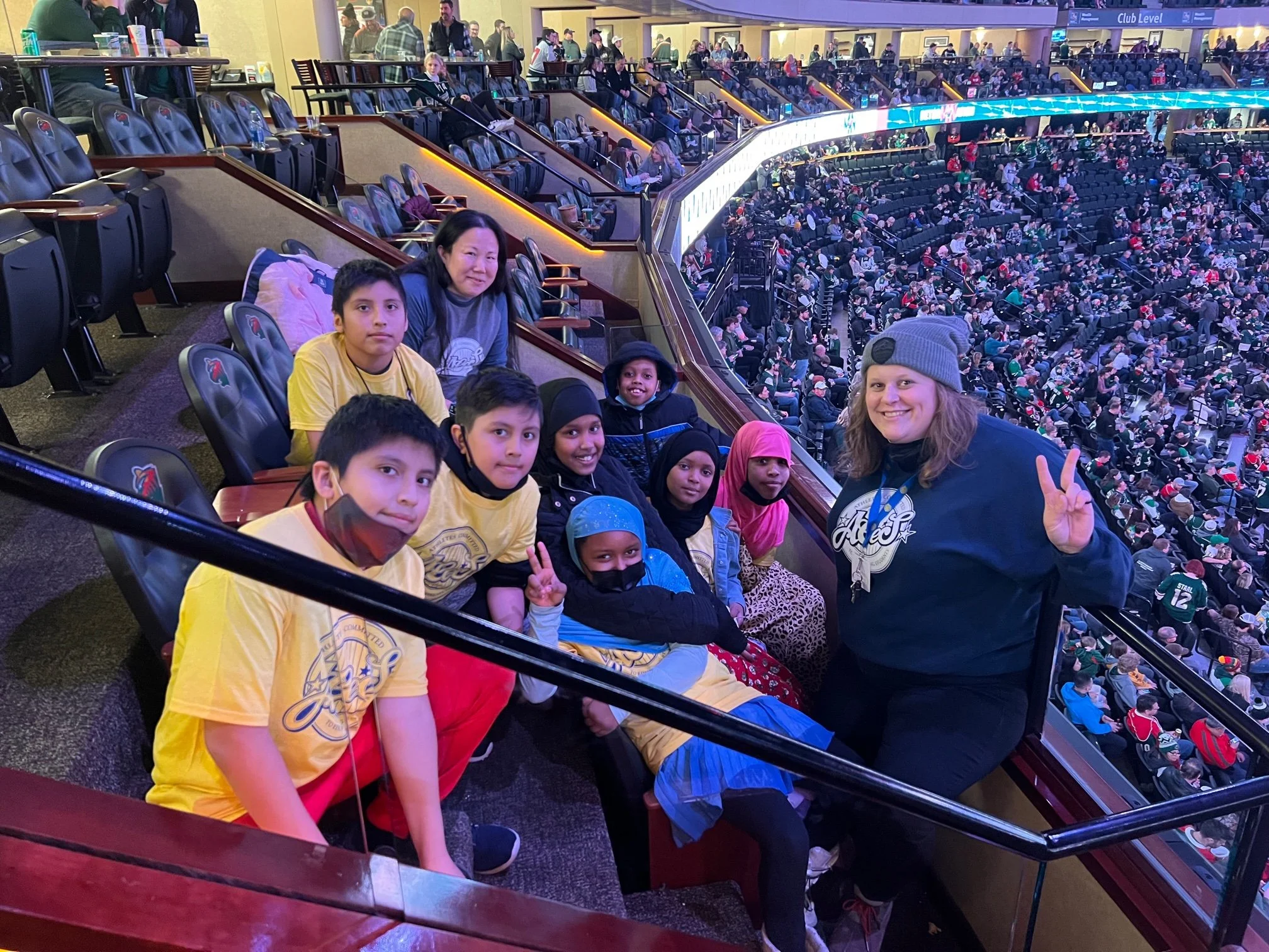 Matt Dumba and Mats Zuccarello host ACES students at the Xcel Energy Center