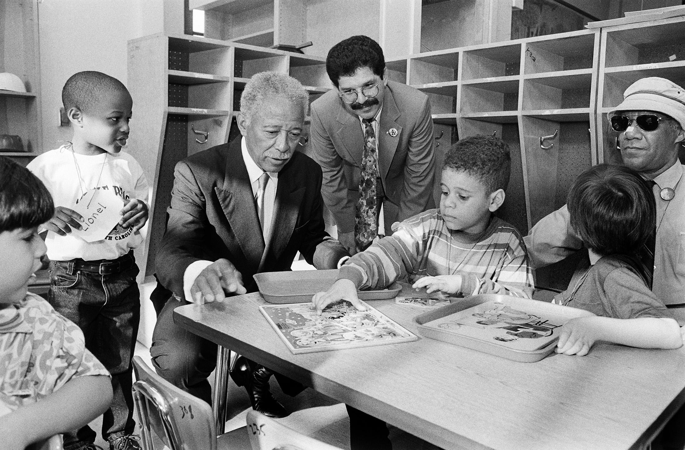 Mayor Dinkins greets students on their first day at P.S. 11 in the Bronx, a "Beacon School," September 9, 1992.