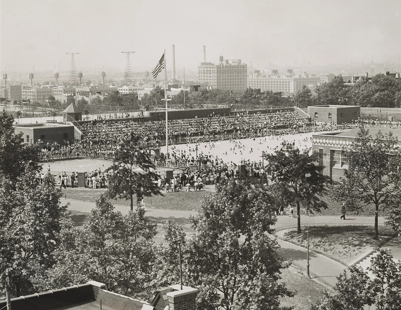 Undated photo of Sunset Park showing the main swimming pool and one of the smaller semi-circular pools. When the pool opened, it had a separate diving pool on one end and a wading pool on the other. NYC Municipal Archives.