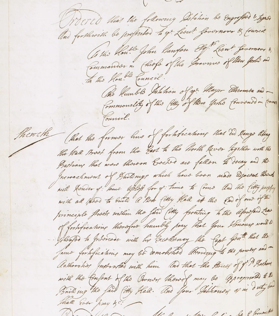 Common Council minutes from August 10, 1699, petition to tear down the fortifications on Wall Street and to use the stones of the bastions to build the new City Hall (on Wall at the end of Broad Street). NYC Municipal Archives.