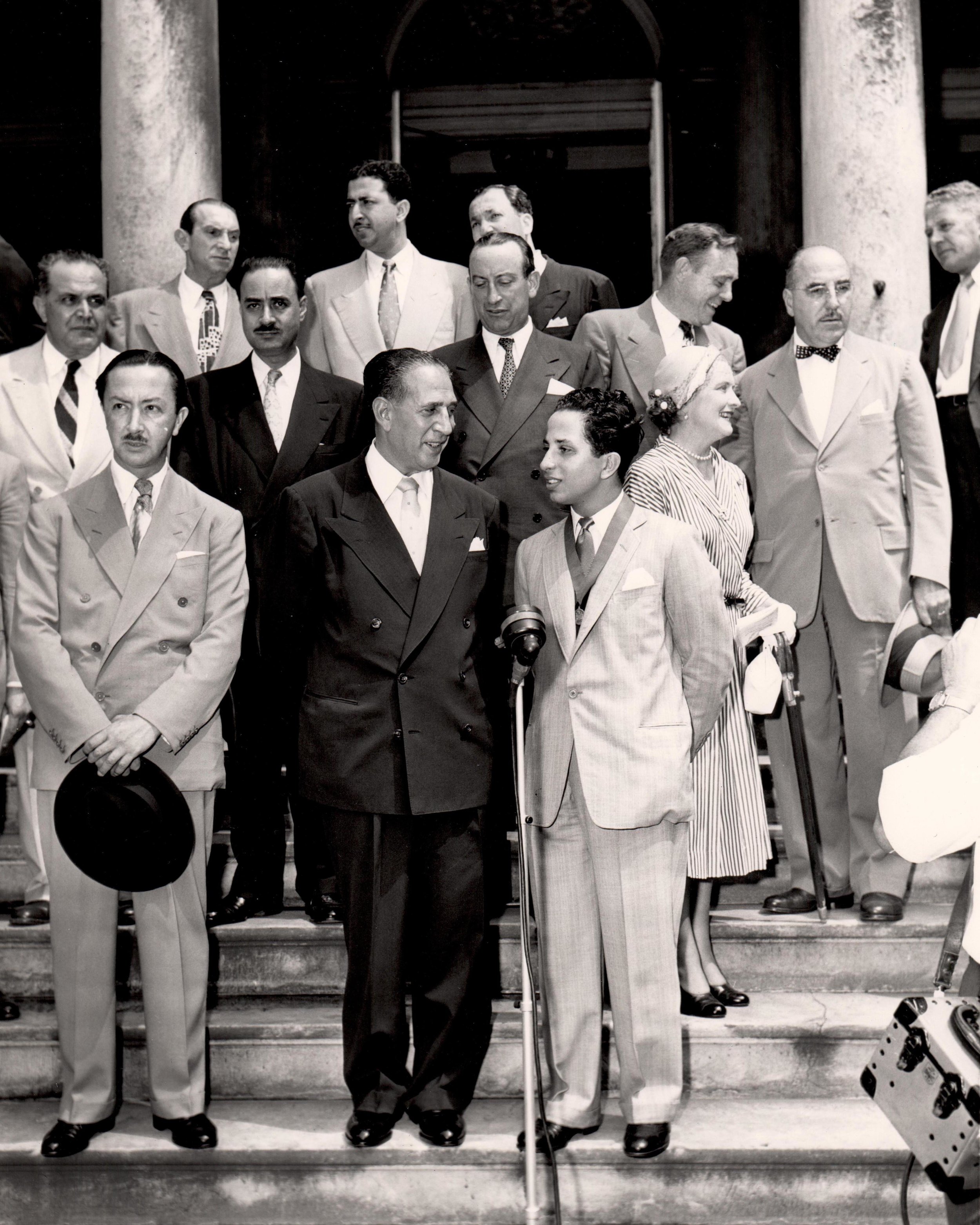 On the steps of City Hall Mayor Vincent R. Impellitteri welcoming King Faisal II to New York City Hall