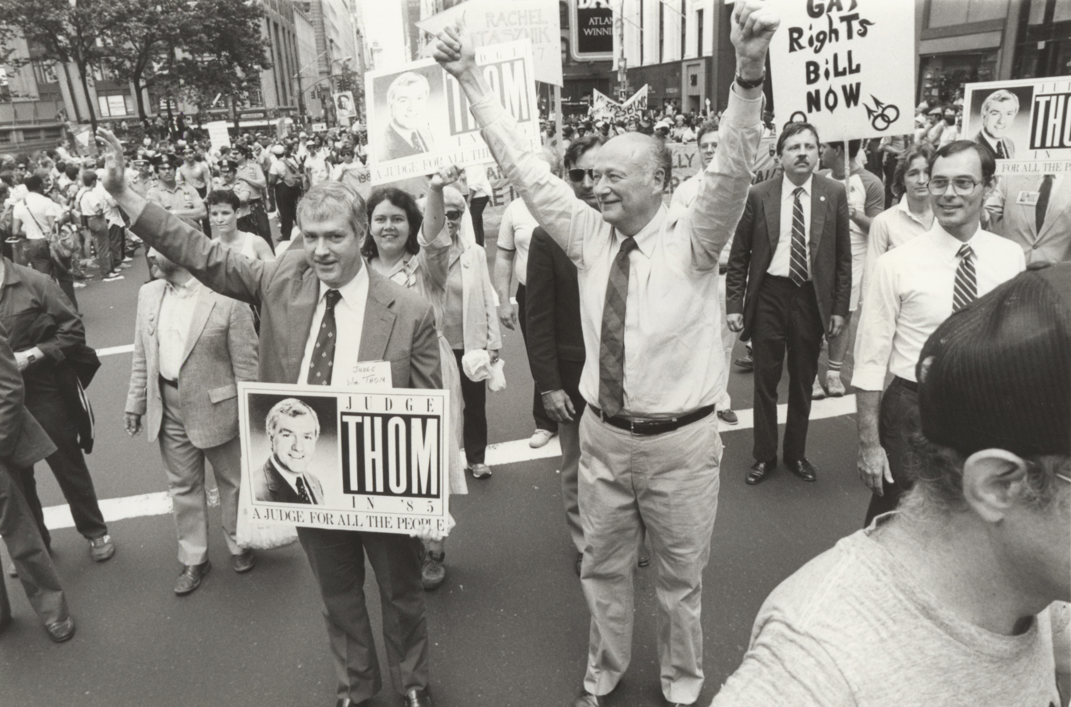 Mayor Koch marching in the 1985 Gay Pride march. Photograph by Holland Wemple. Mayor Edward I. Koch collection, NYC Municipal Archives.