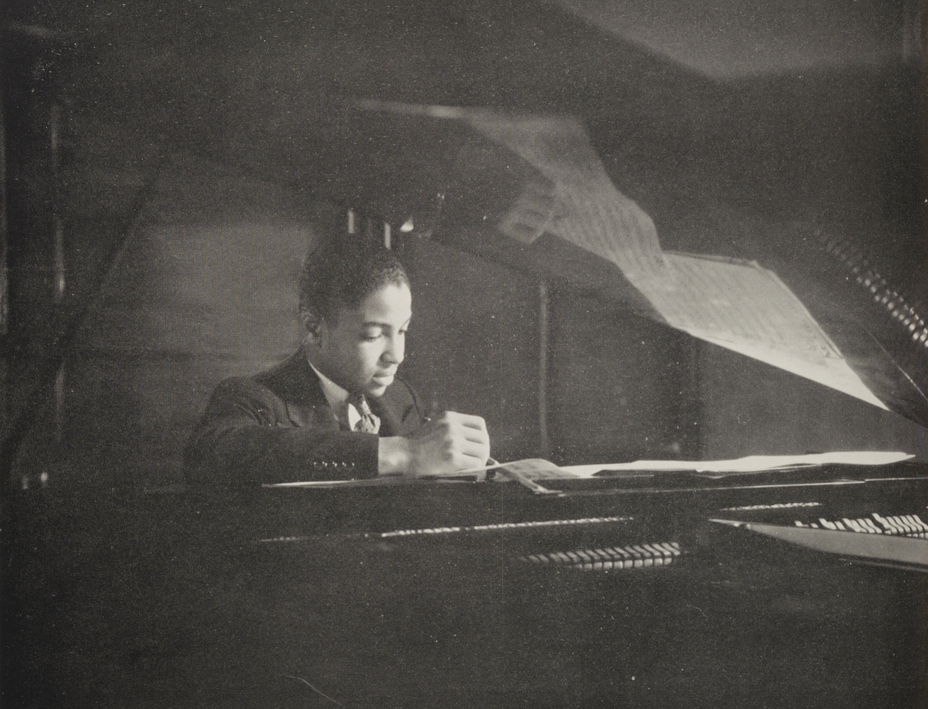 A young man composing a song in the music class at Haaren High School.