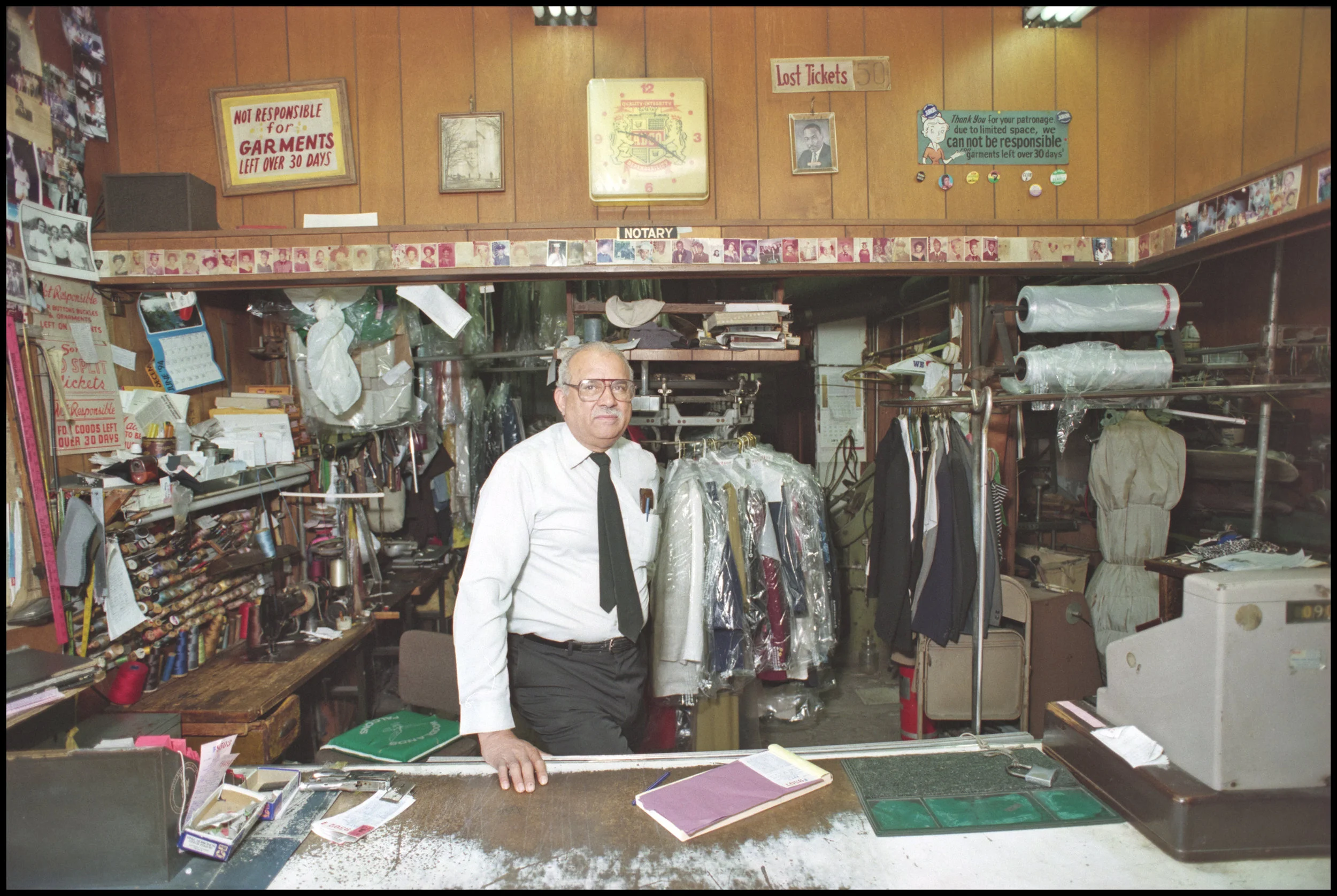 Dry cleaner, West 140th Street, Harlem, 1994. Photograph by Larry Racioppo.