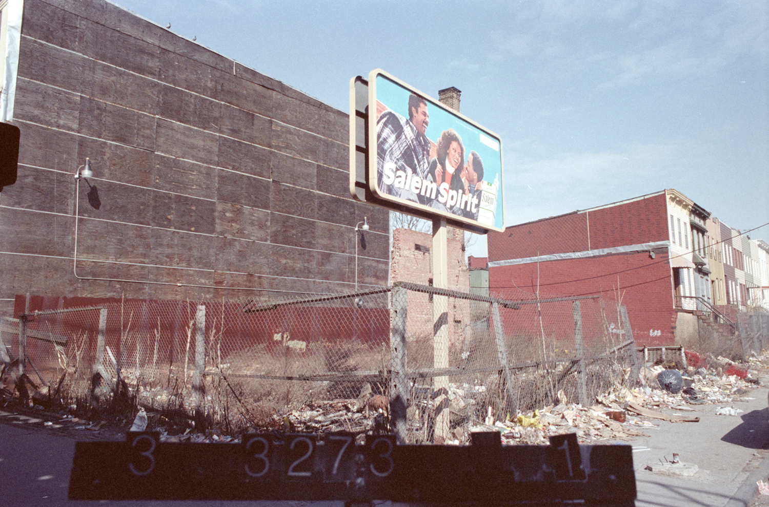 An empty lot shown here in the 1980s located at 1213 Broadway next door to what once was a furniture store. Department of Finance Collection, NYC Municipal Archives.