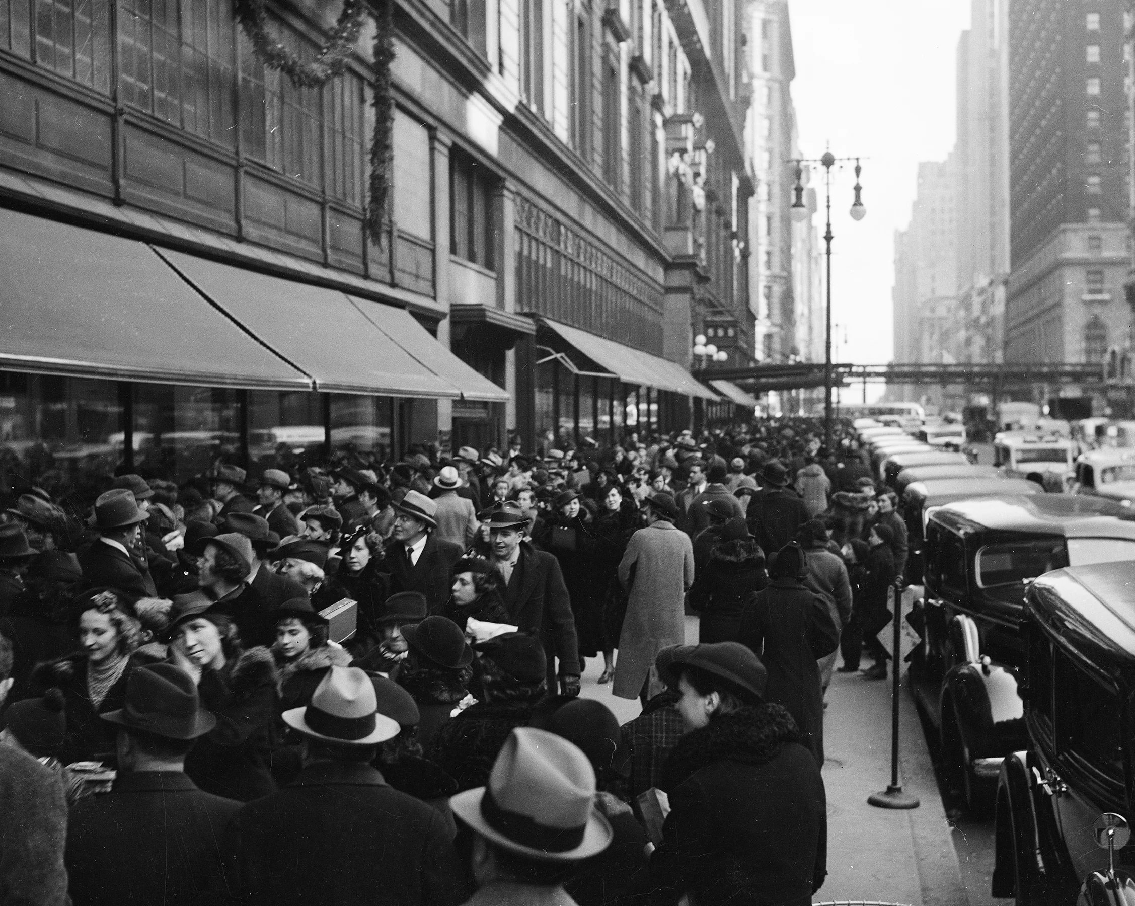 Christmas shoppers on West 34th Street, in front of Macy's, ca. 1937. WPA Federal Writers' Project Collection, NYC Municipal Archives.