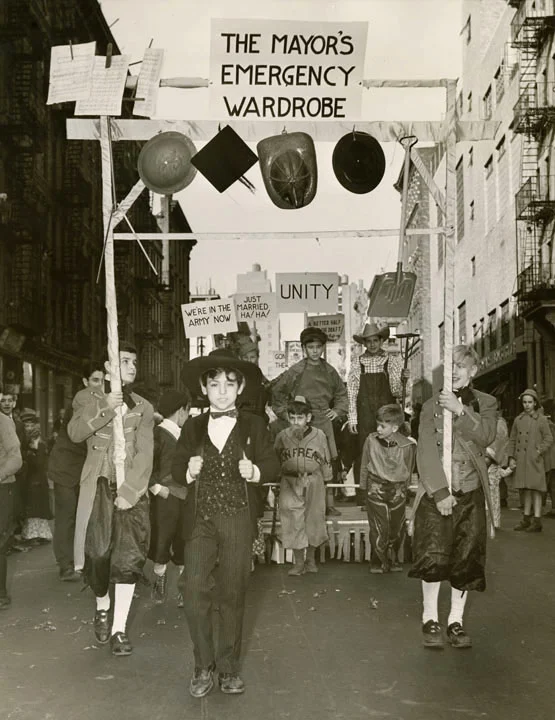 Madison Square Boys’ Club Thanksgiving Day Parade. “The Mayor’s Emergency Wardrobe Hanging fireman’s helmet, mortarboard, shovel, music.” November 1940, Mayor Fiorello H. LaGuardia, NYC Municipal Archives.