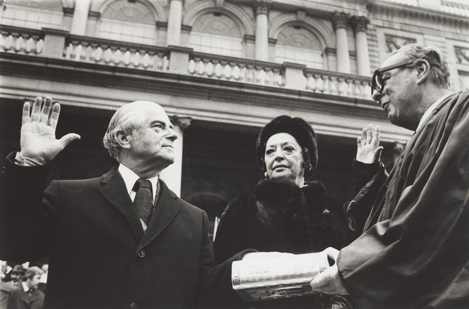 Abraham D. Beame takes the oath besides his wife, January 1, 1974. Photo by Dick De Marsico, Mayor Beame Papers, NYC Municipal Archives.