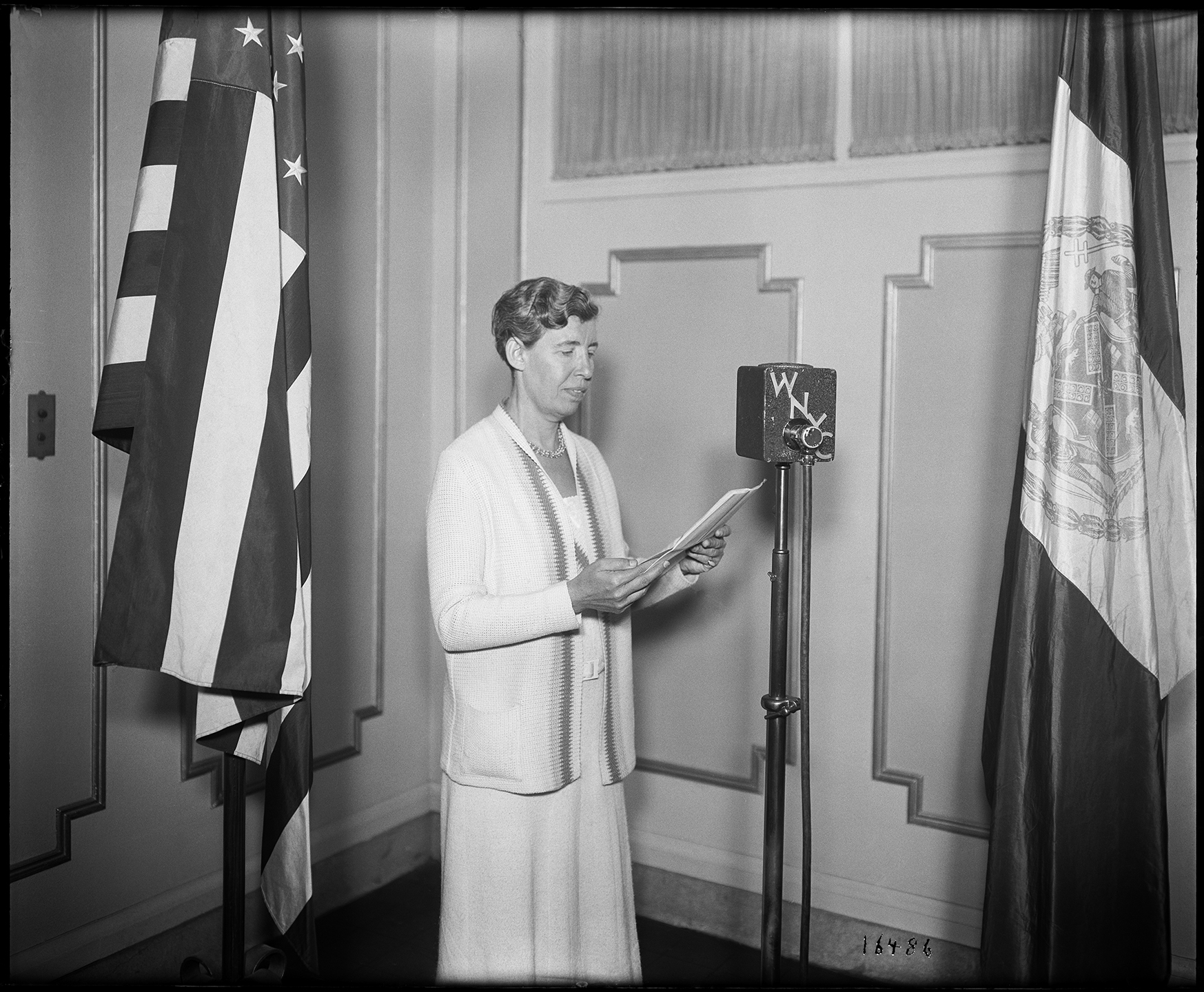 Rebecca Rankin, giving an address on WNYC radio, September 14, 1934. Photograph by Eugene de Salignac. Department of Bridges/Plant & Structures Collection, NYC Municipal Archives.