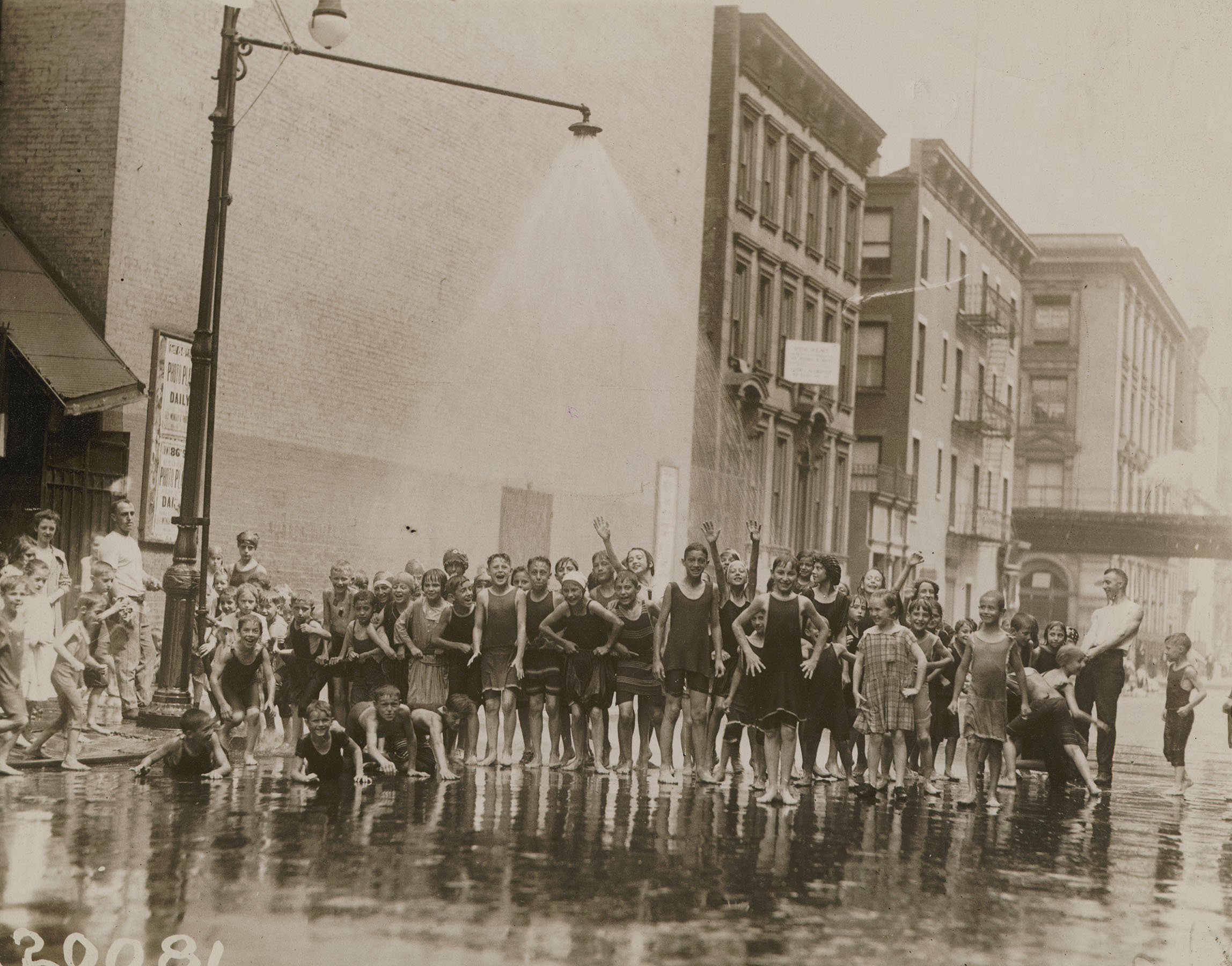 Sprinkler, 85th Street and Lexington Avenue, August 17, 1920. International Newsreel, Inc. Mayor's Reception Committee, NYC Municipal Archives.
