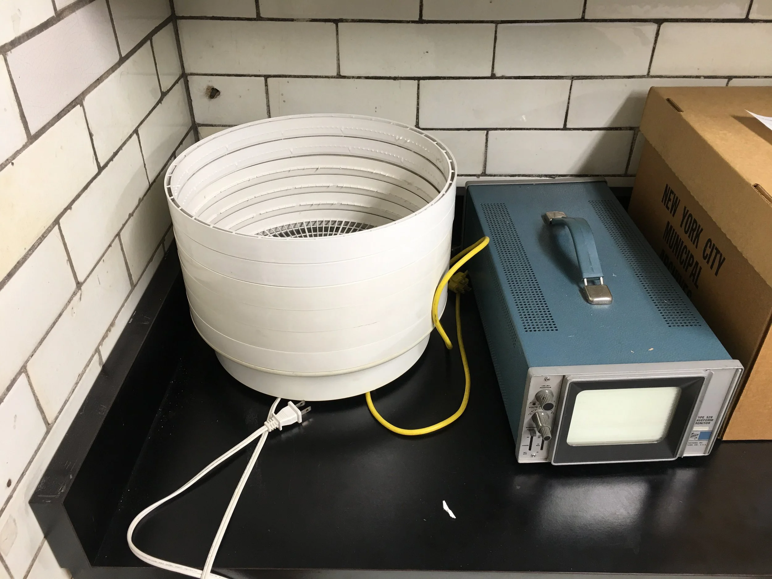 The Snackmaster Dehydrator 2400 from American Harvest can bake up to three ¾” U-matic tapes at a time, with modifications.