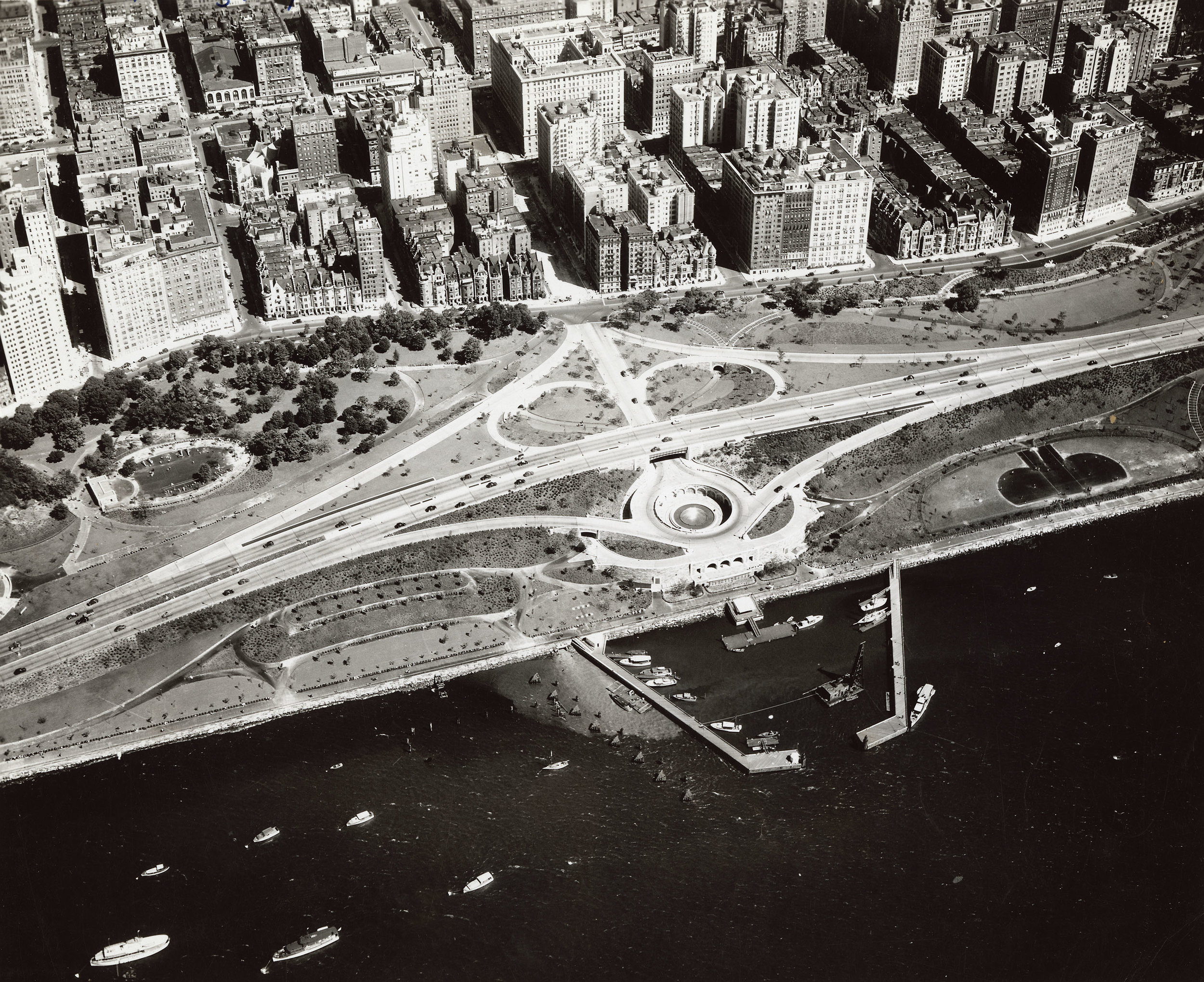 Aerial view of the 79th Street Boat Basin and Henry Hudson Parkway interchange, ca. 1936. NYC Municipal Archives Collection. Moses leveraged federal highway funding to complete an earlier “West Side Improvement” plan and added a marina, known as the 79th Boat Basin in Riverside Park.