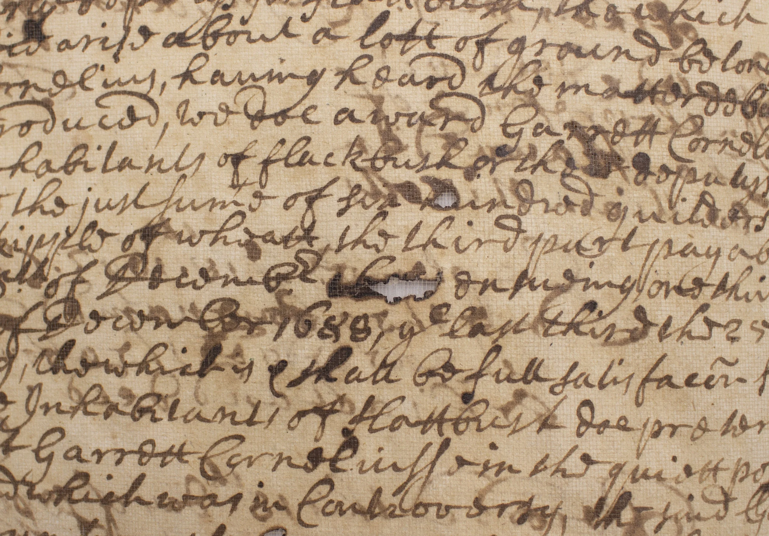 Example of "burn through" in an untreated page with iron gall ink.