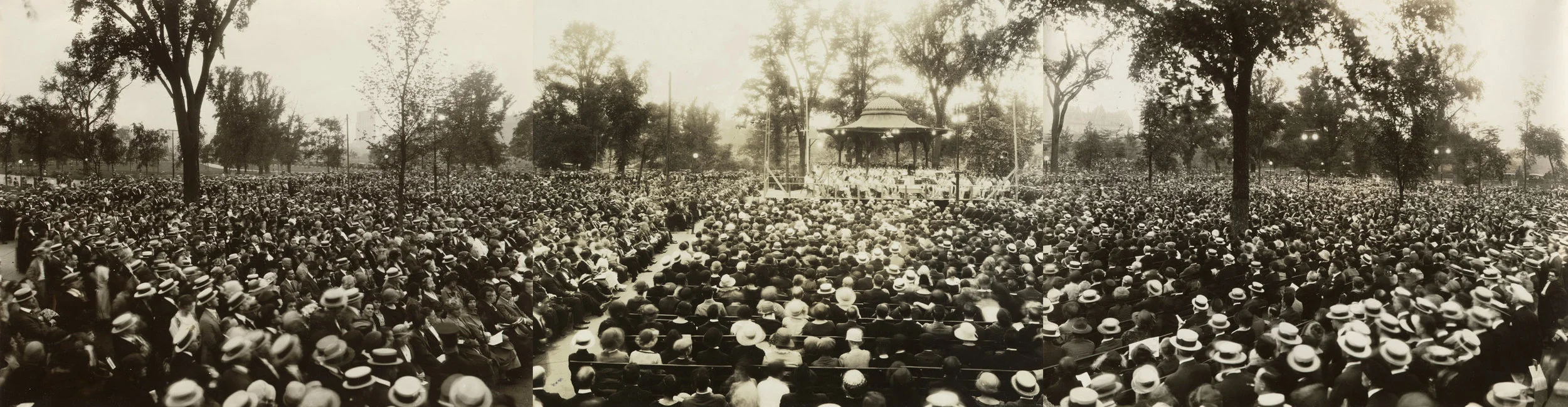 Large crowds gather to enjoy a concert in the park, c. 1910. The bench seating was designed by Calvert Vaux especially for concert-goers around the Music Pavilion. Photo by A. Tennyson Beals, NYC Municipal Archives Collection.