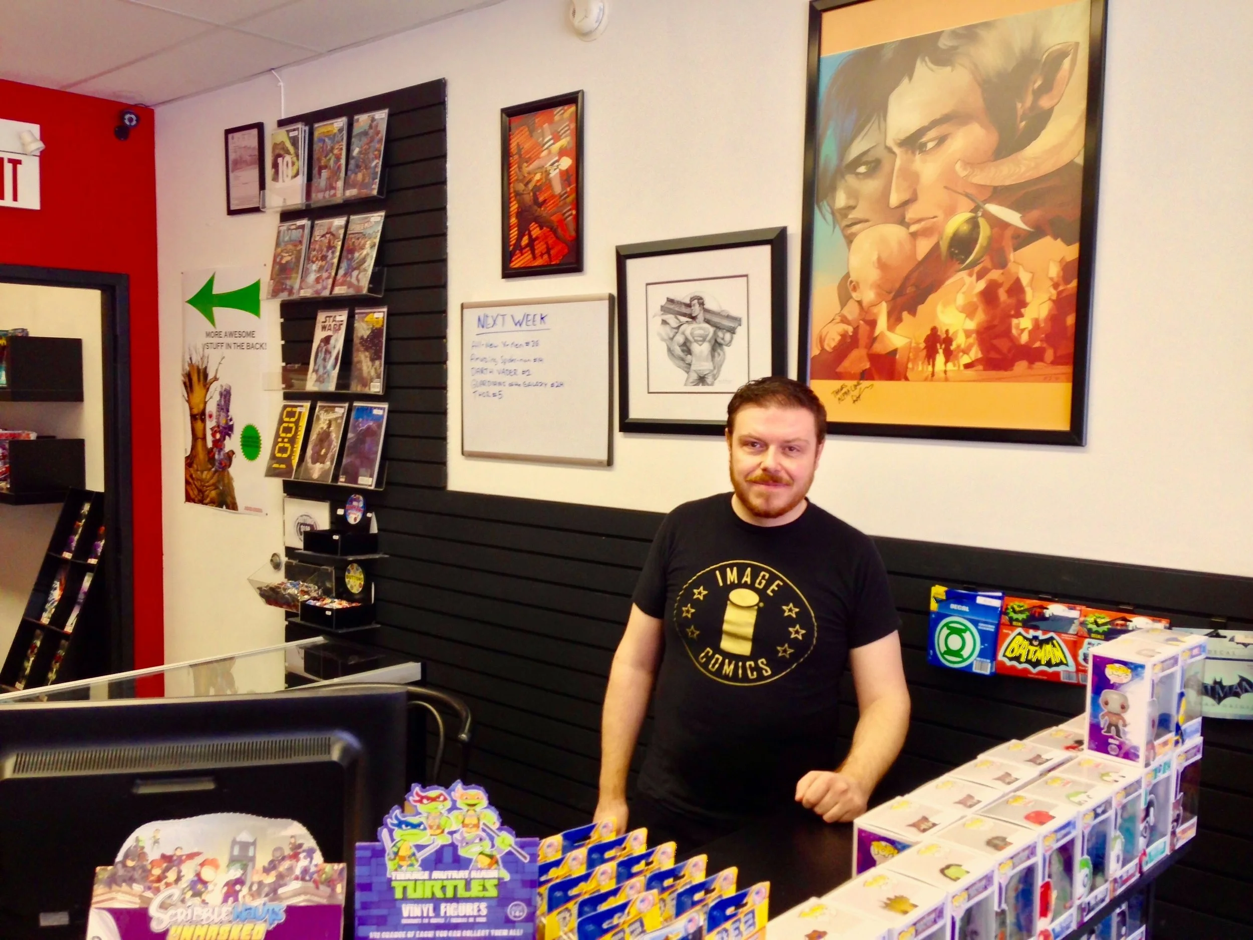 Chris, owner of Alpha Comics in Calgary, Alberta, Canada (Photo credit: GeekNerdNet.com)