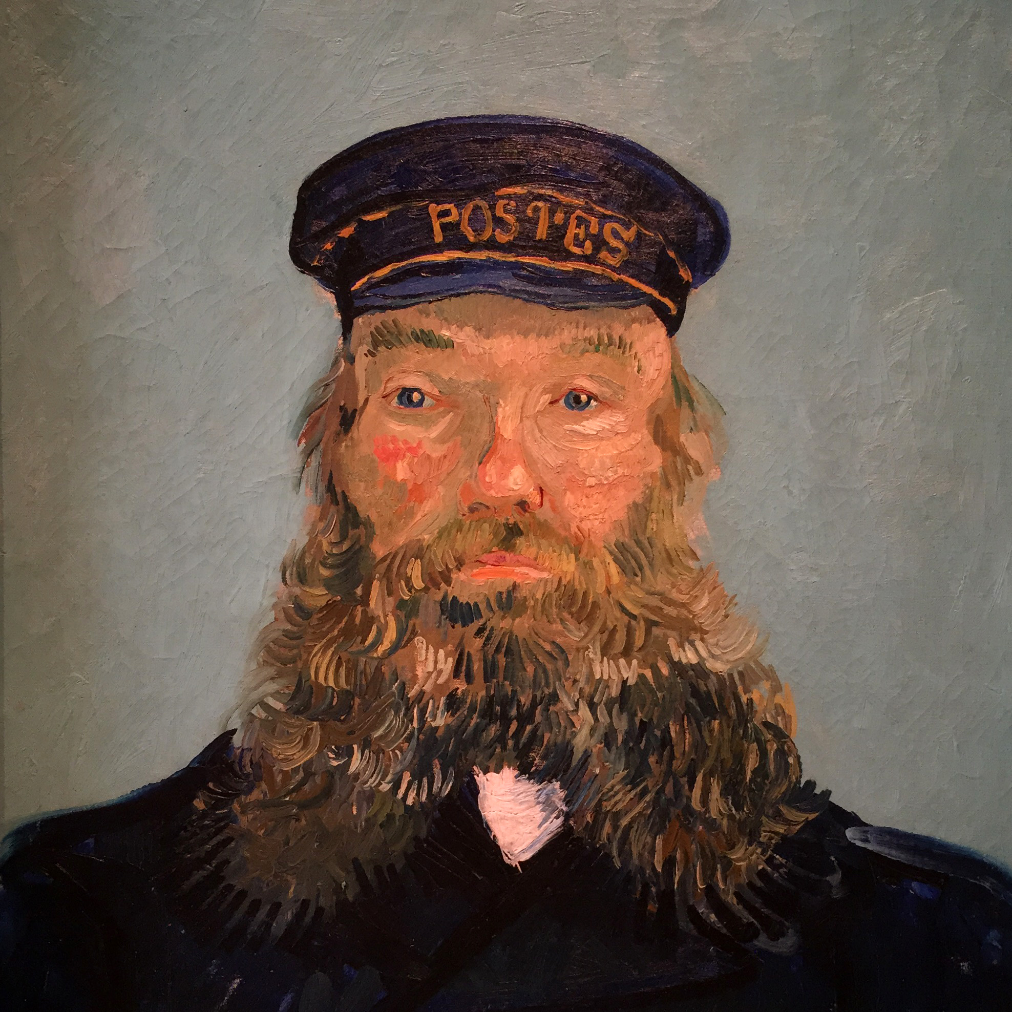 Get up close and personal with Van Gogh's portrait of Postman Roulin. 