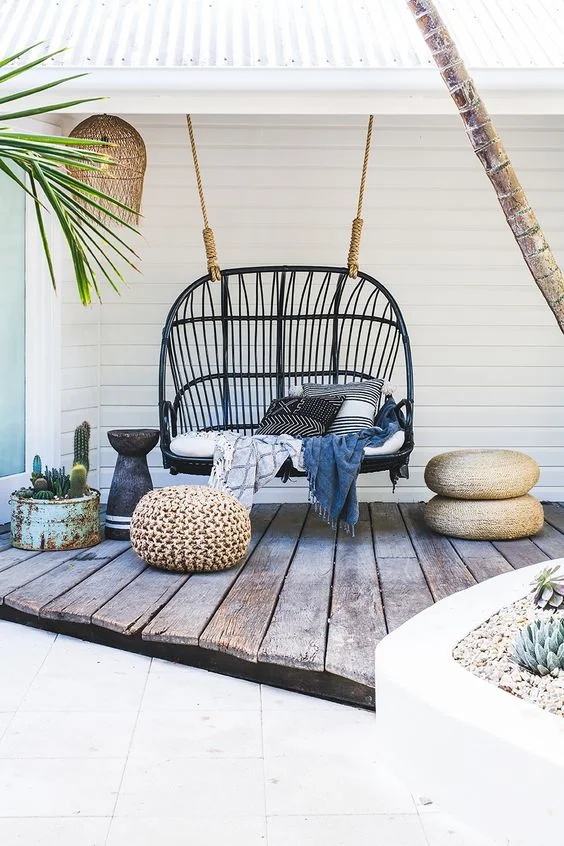  Outdoor Bohemian space with rattan swing found on Pinterest via My Plant Club. 