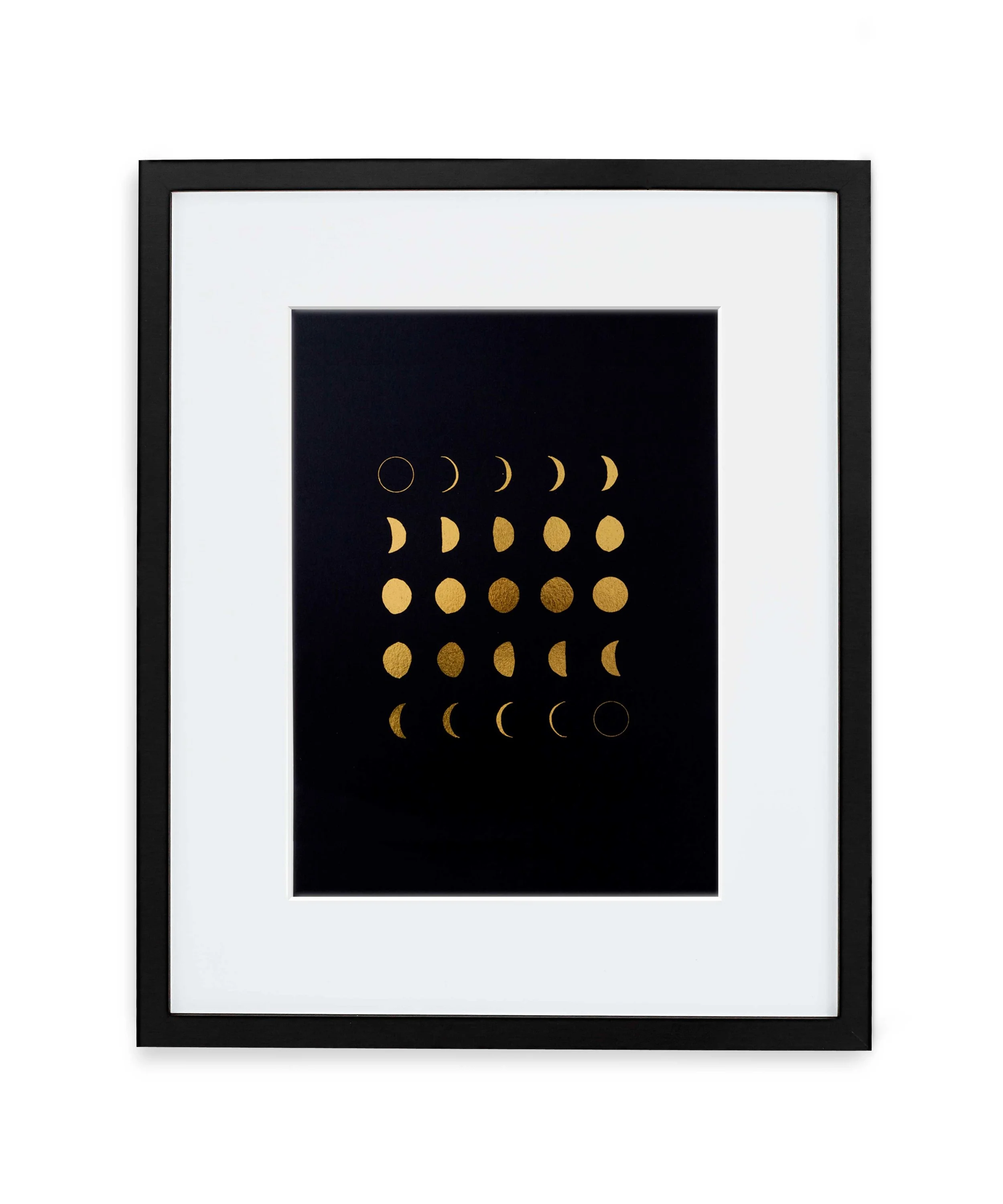 Moon phases gold foil art print in black frame. By Swell Made Co.