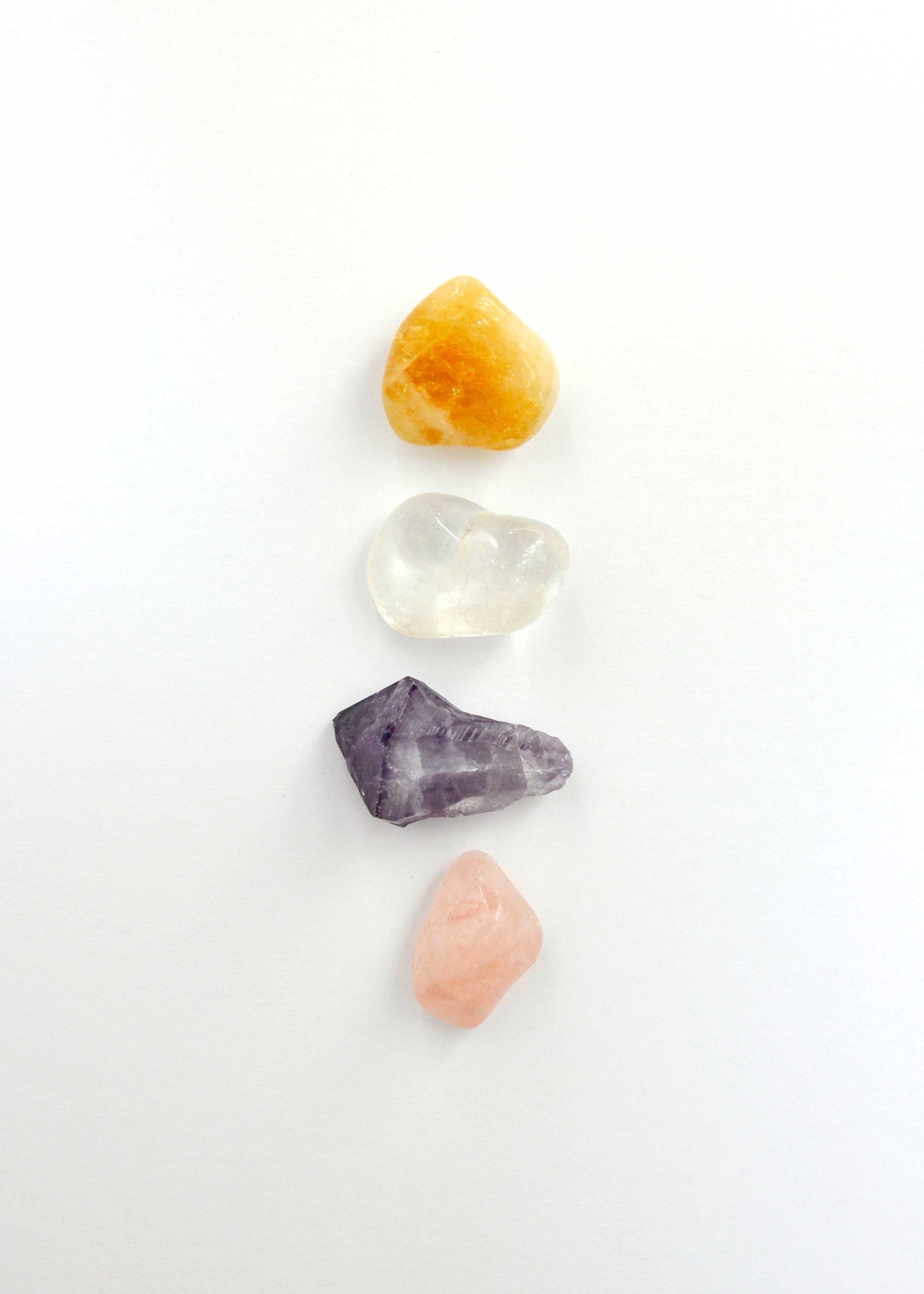 Essential crystals for the beginner collection. Citrine, clear quartz, amethyst and rose quartz. And don't forget black tourmaline.
